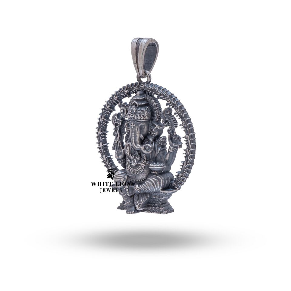 Back view of Atharva Ganesha Pendant showcasing detailed craftsmanship in sterling silver.