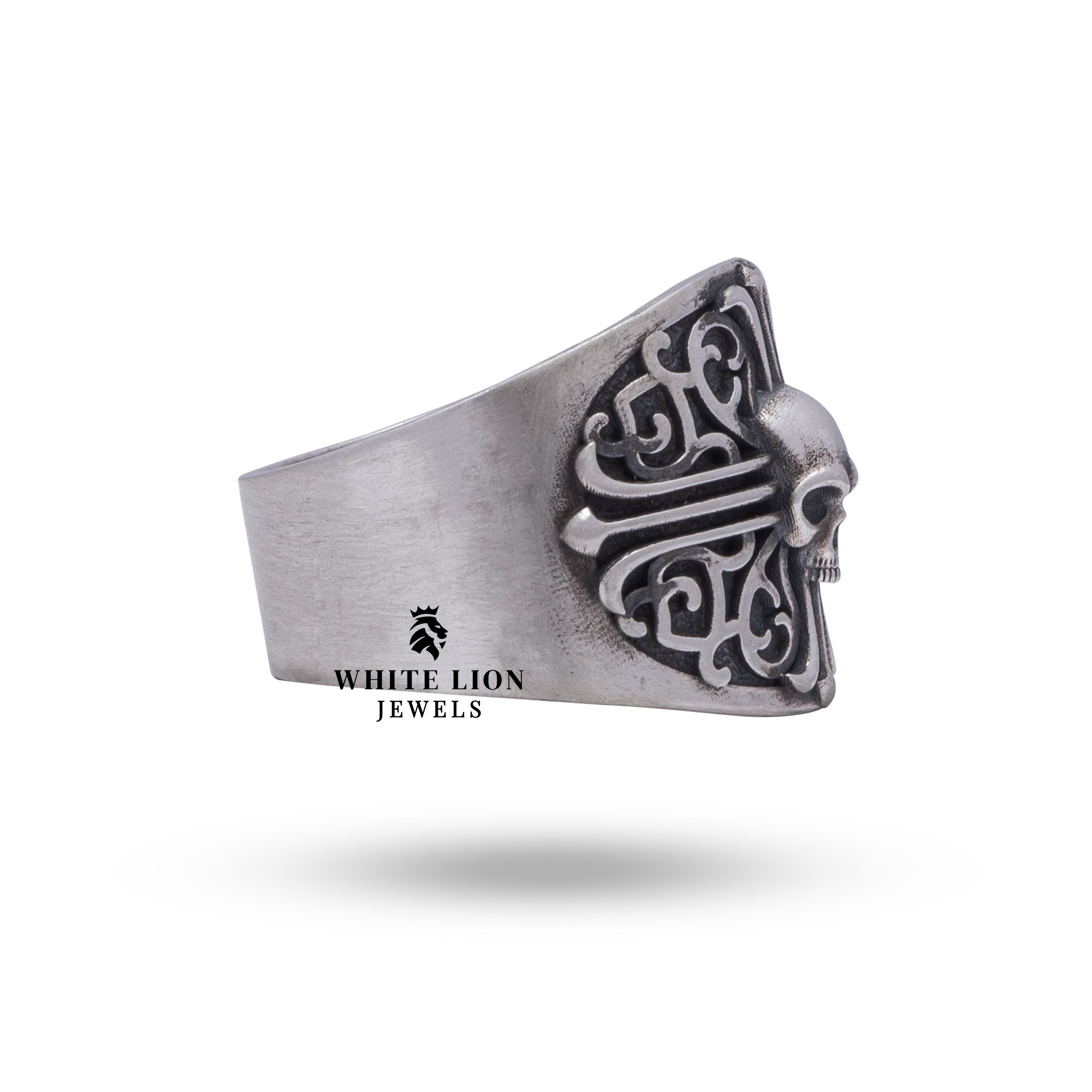 Detailed view of Cross Pattern Gothic Skull Ring depicting its skull motif in 925 sterling silver.