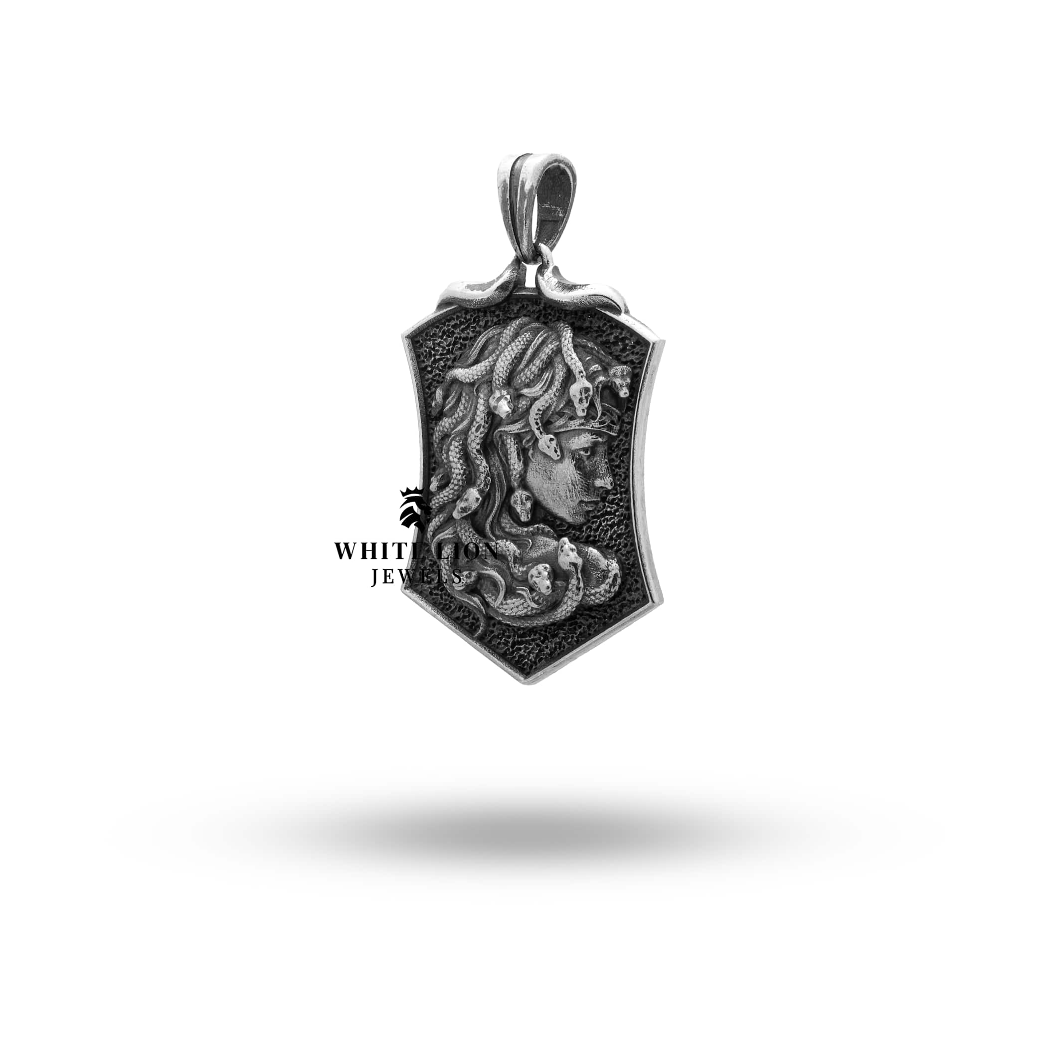 Medusa Snakes Shield Pendant styled as a necklace with sterling silver chain speaking elegance.