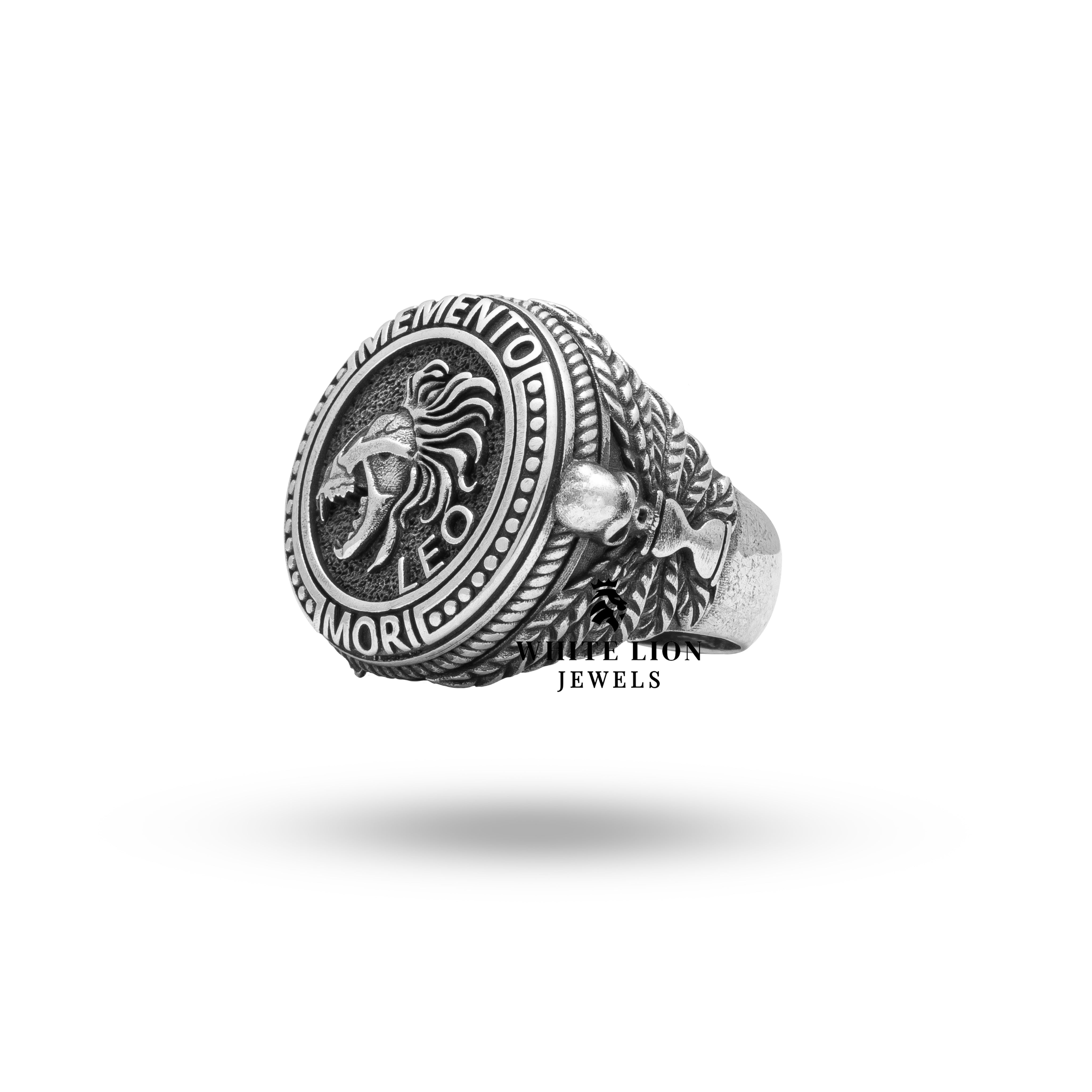 Detailed image of the Zodiac Lion and Skull motifs on the oxidized silver ring, showcasing craftsmanship.
