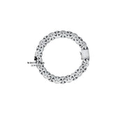 Model wearing the Royal Cuban Cross Bracelet, showcasing its elegance and versatility as a fashion accessory.