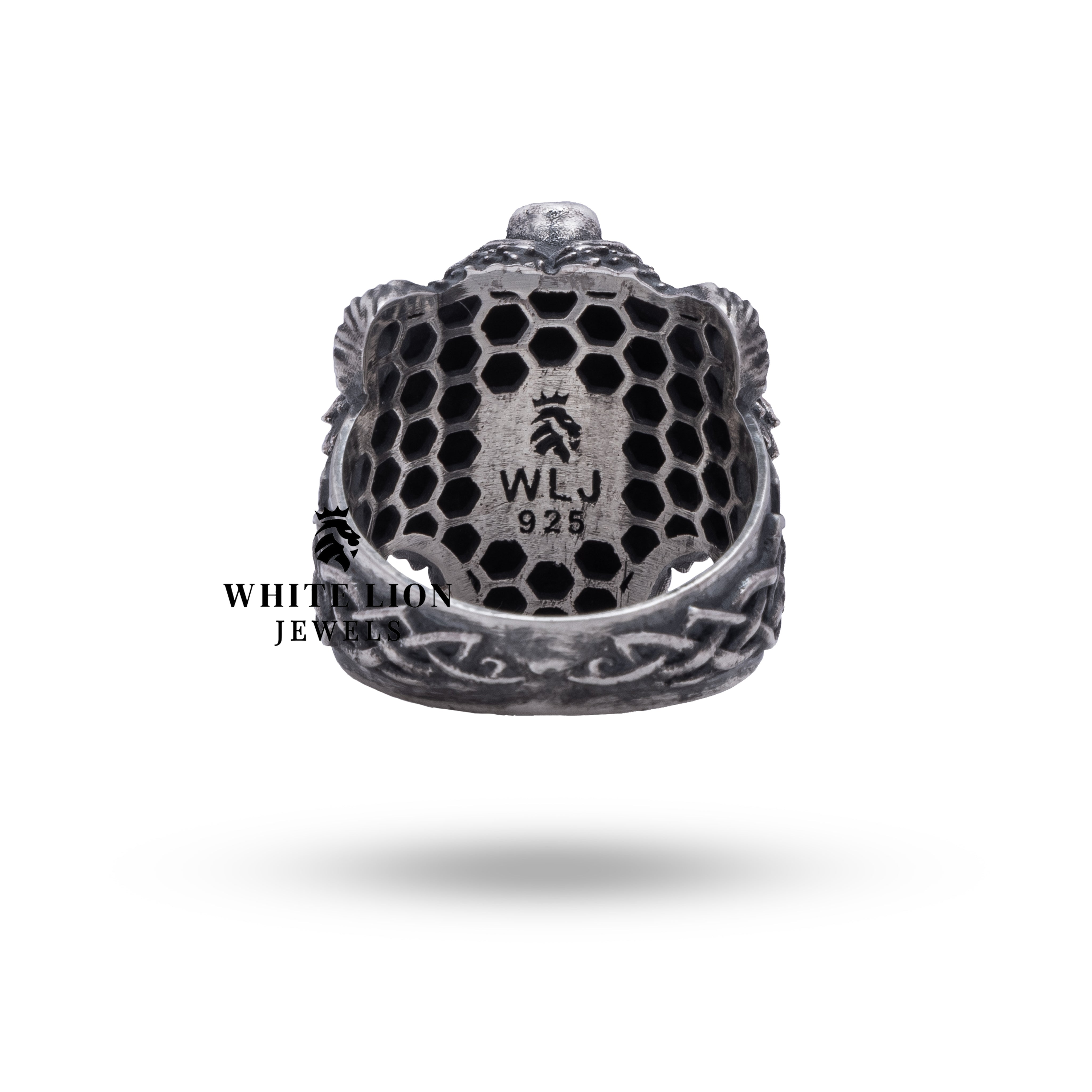 Detailed look at the 2.5 cm diameter silver ring, featuring a Viking berserker bear, handcrafted for durability.