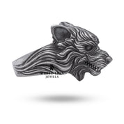 Lifestyle image of the Angry Wolf Head Silver Ring highlighting artisanal craftsmanship.