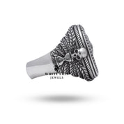 Detailed view highlighting the Capricorn symbol on silver ring with oxidized finish.