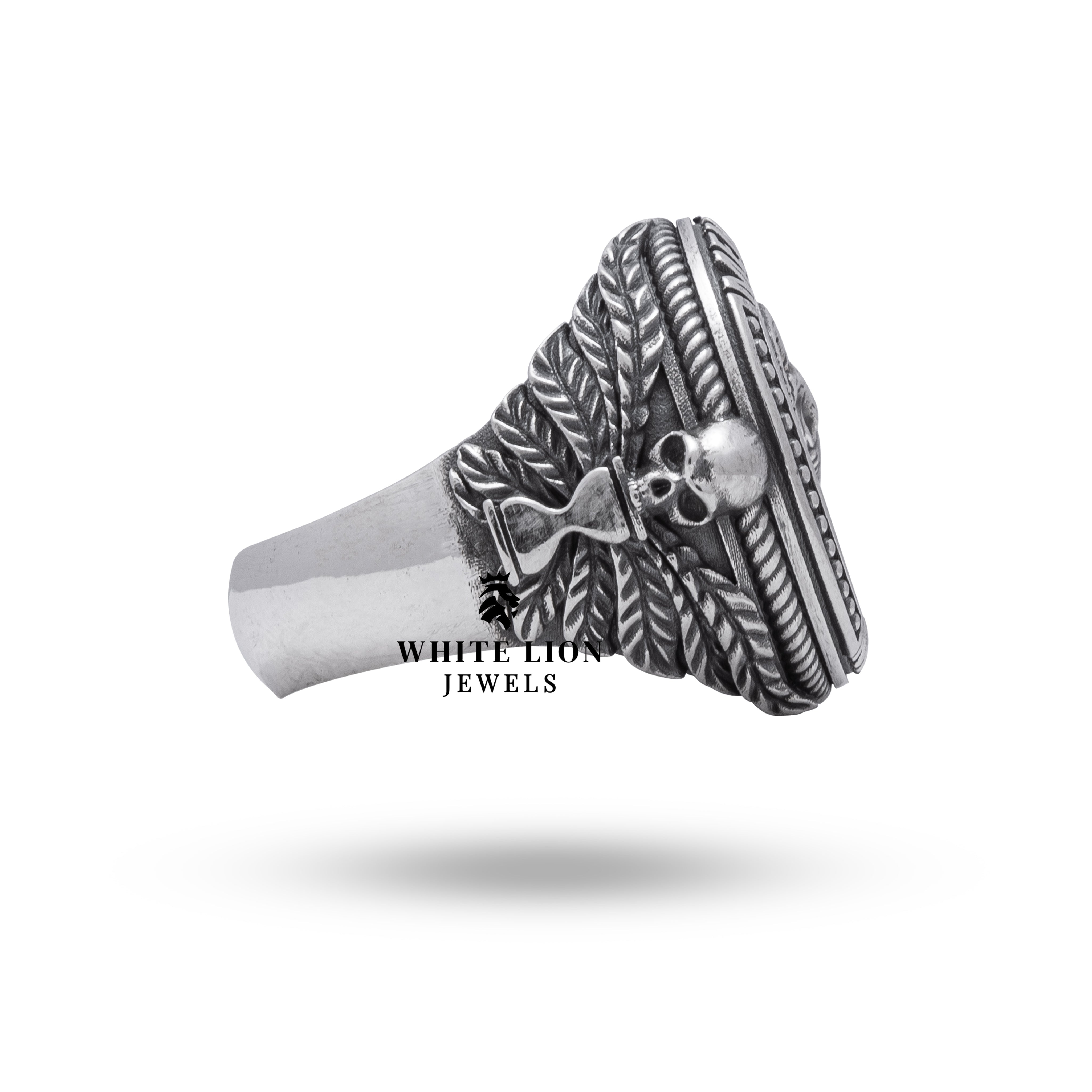 Detailed view highlighting the Capricorn symbol on silver ring with oxidized finish.