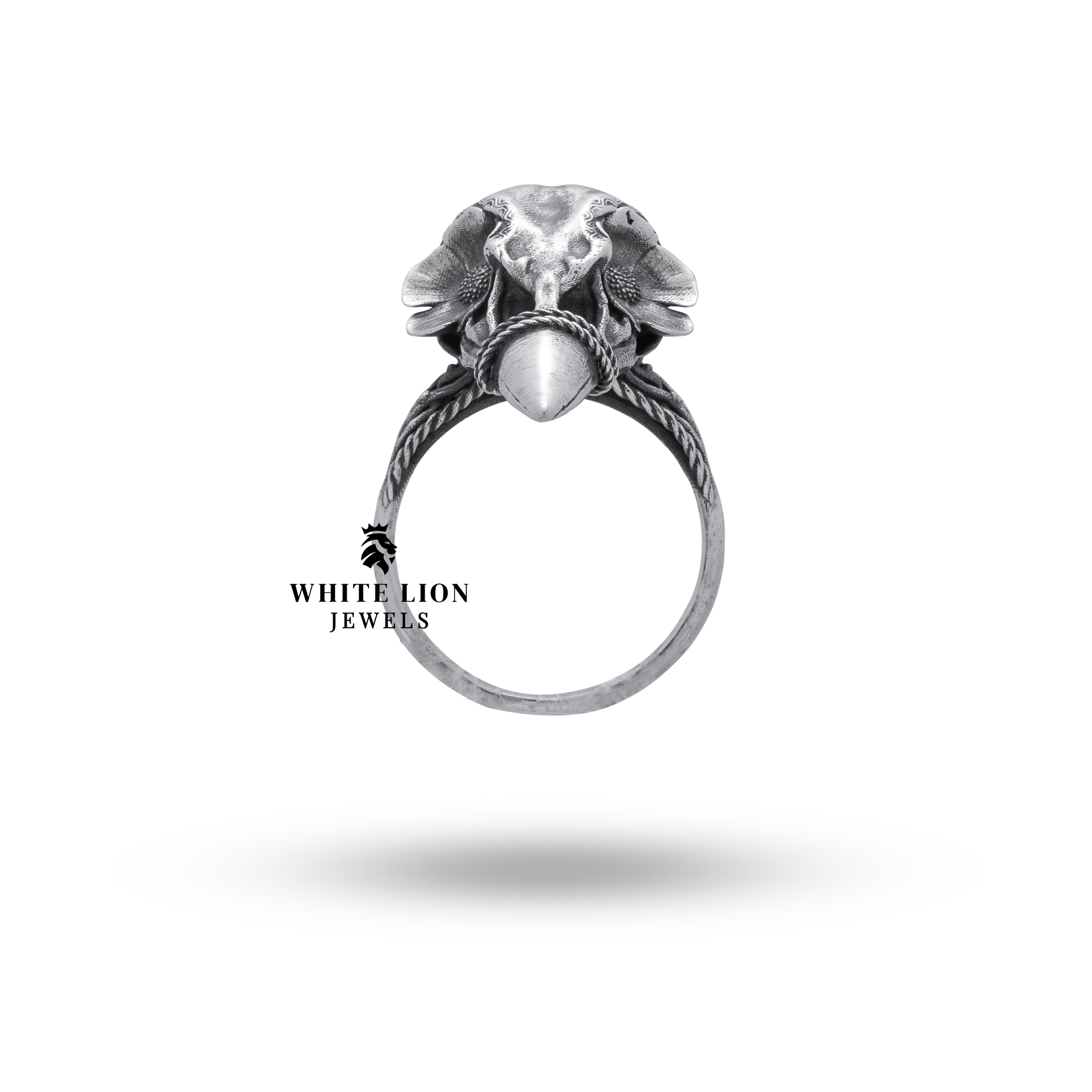 Back view of the Bird Gothic Skull ring, highlighting the smooth finish and detailed flower engravings in sterling silver.