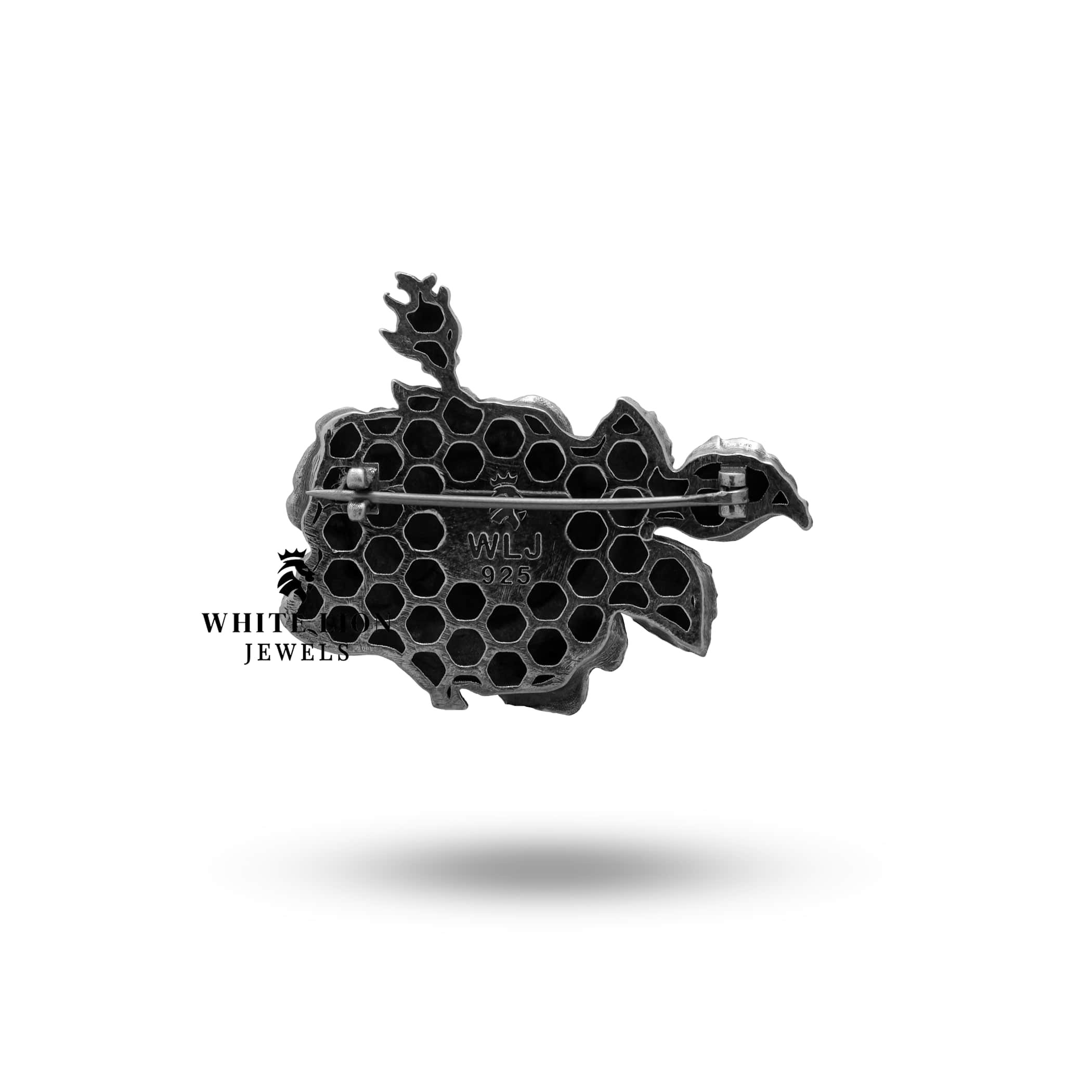 Nickel free silver brooch with a love and passion theme from White Lion Jewels.