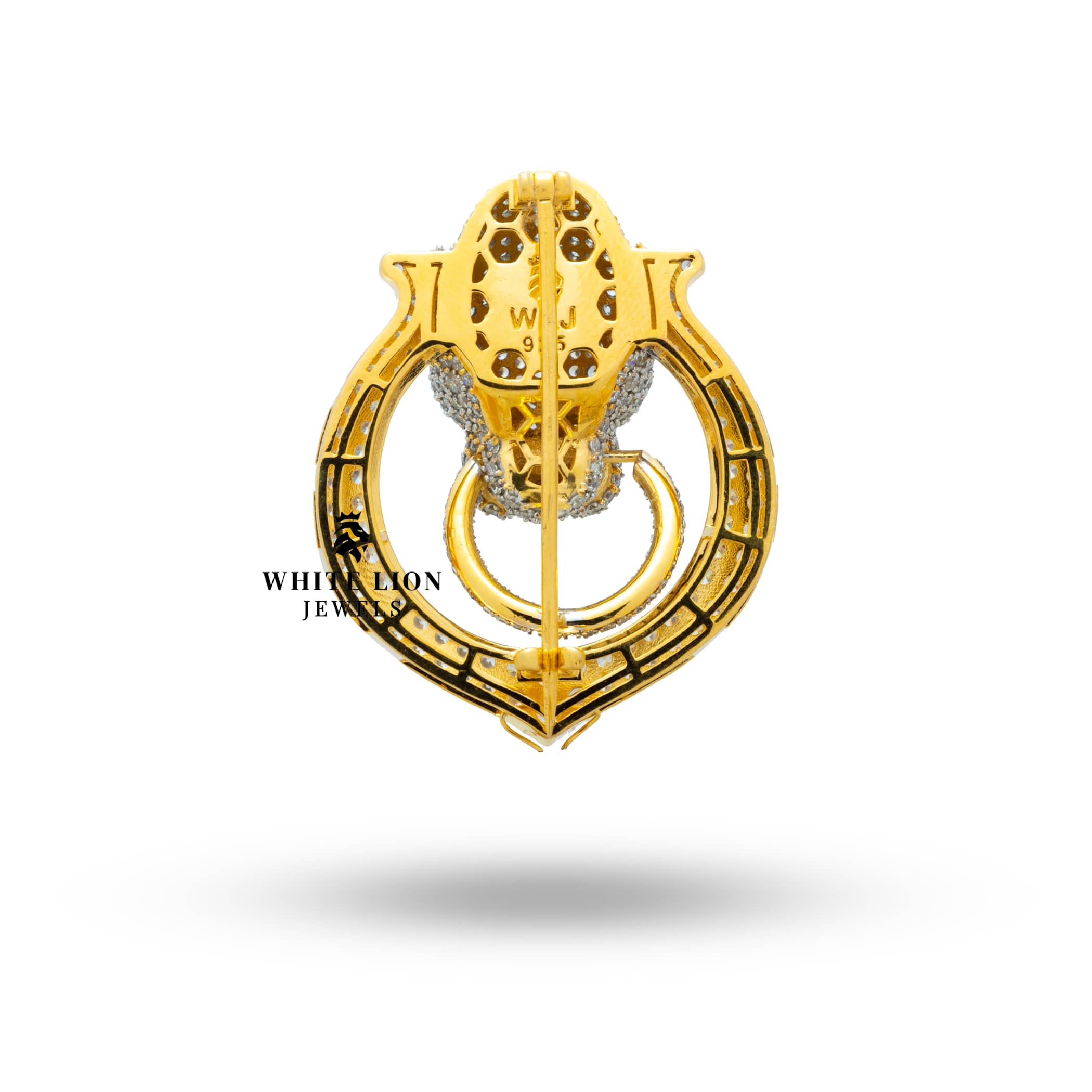 Jaguar Panther gold plated brooch worn on a black dress for elegant styling