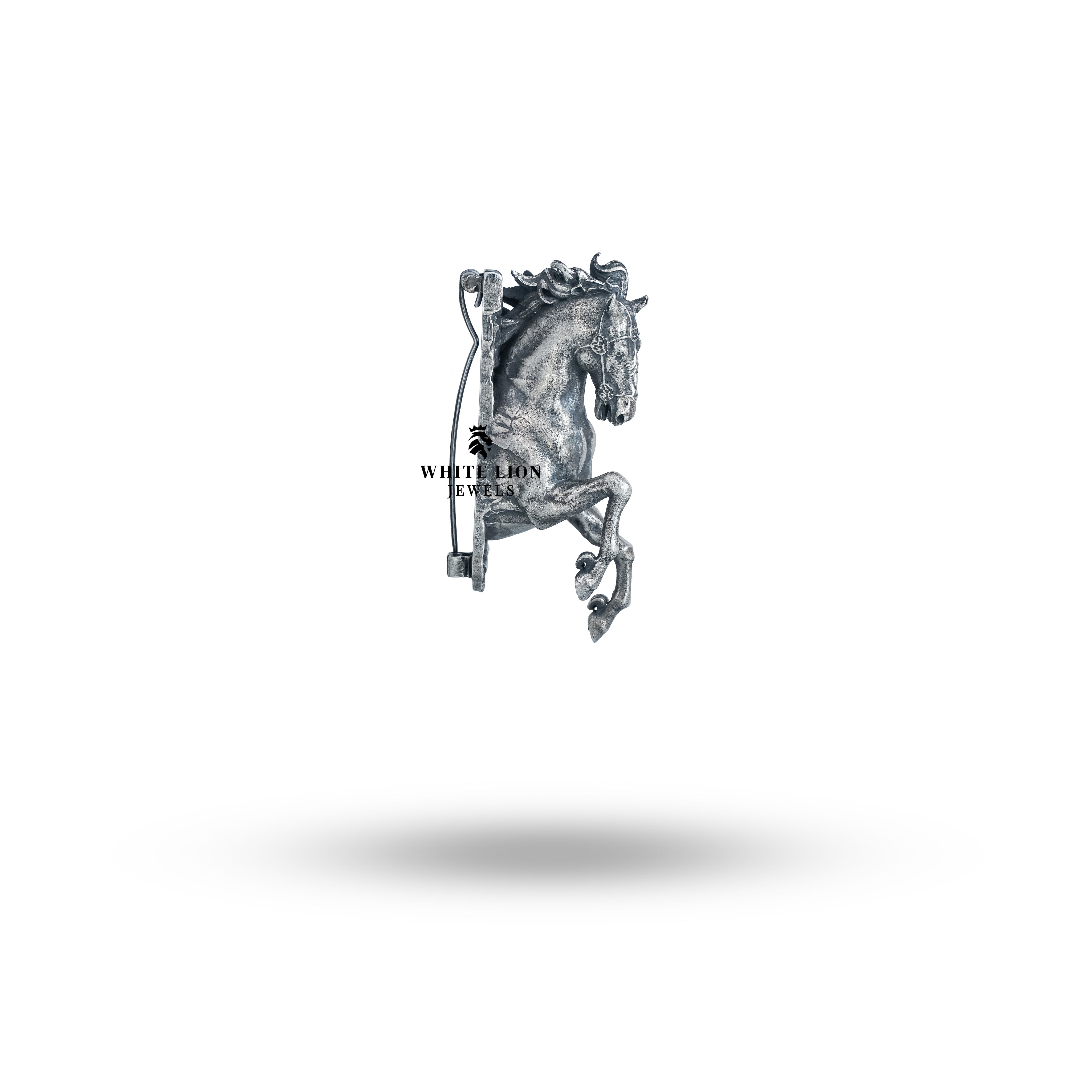 Elegant styling of the Rearing Horse Brooch worn with a blazer for a chic look.