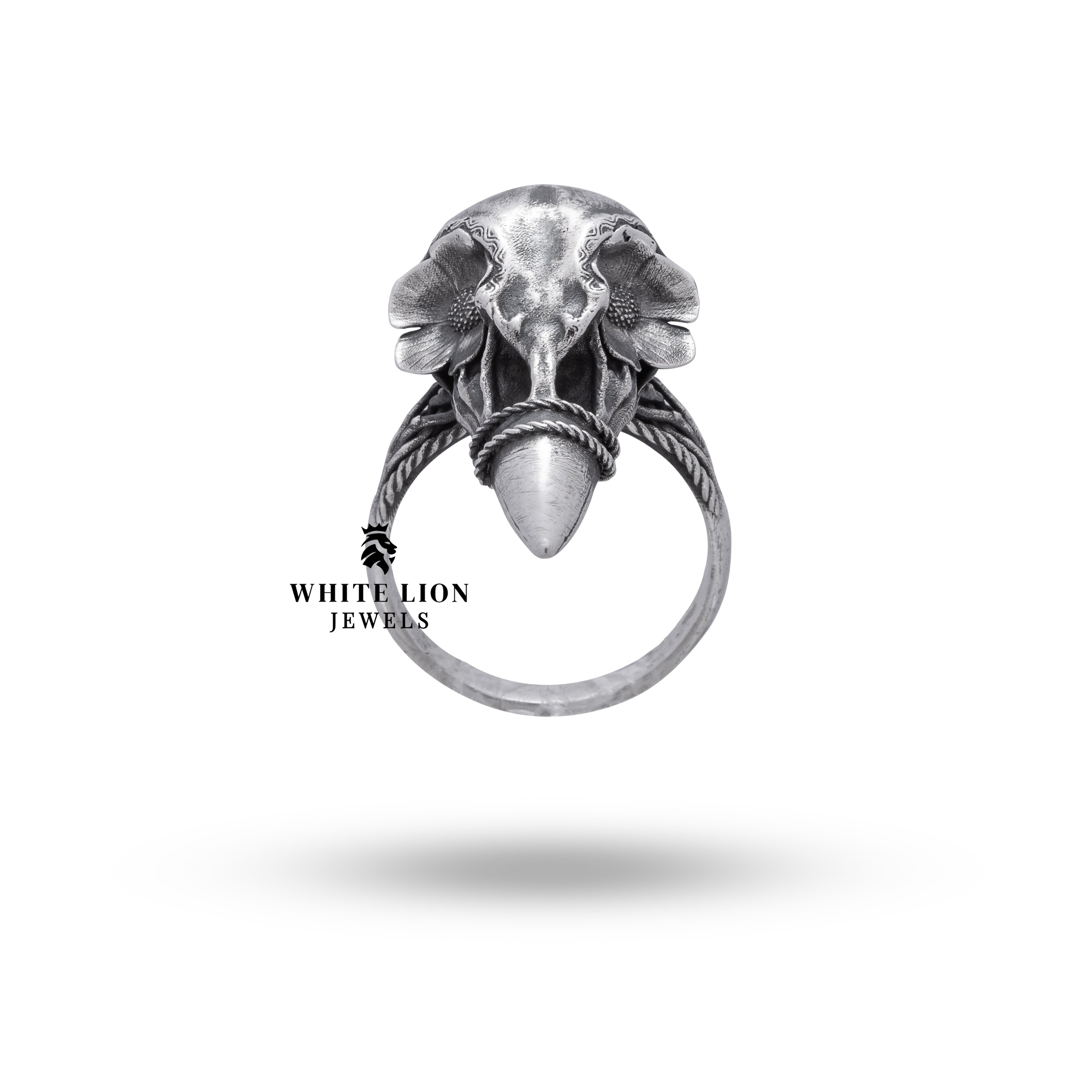 Side angle of Bird Gothic Skull with flower design in oxidized silver, showcasing intricate craftsmanship of the ring.