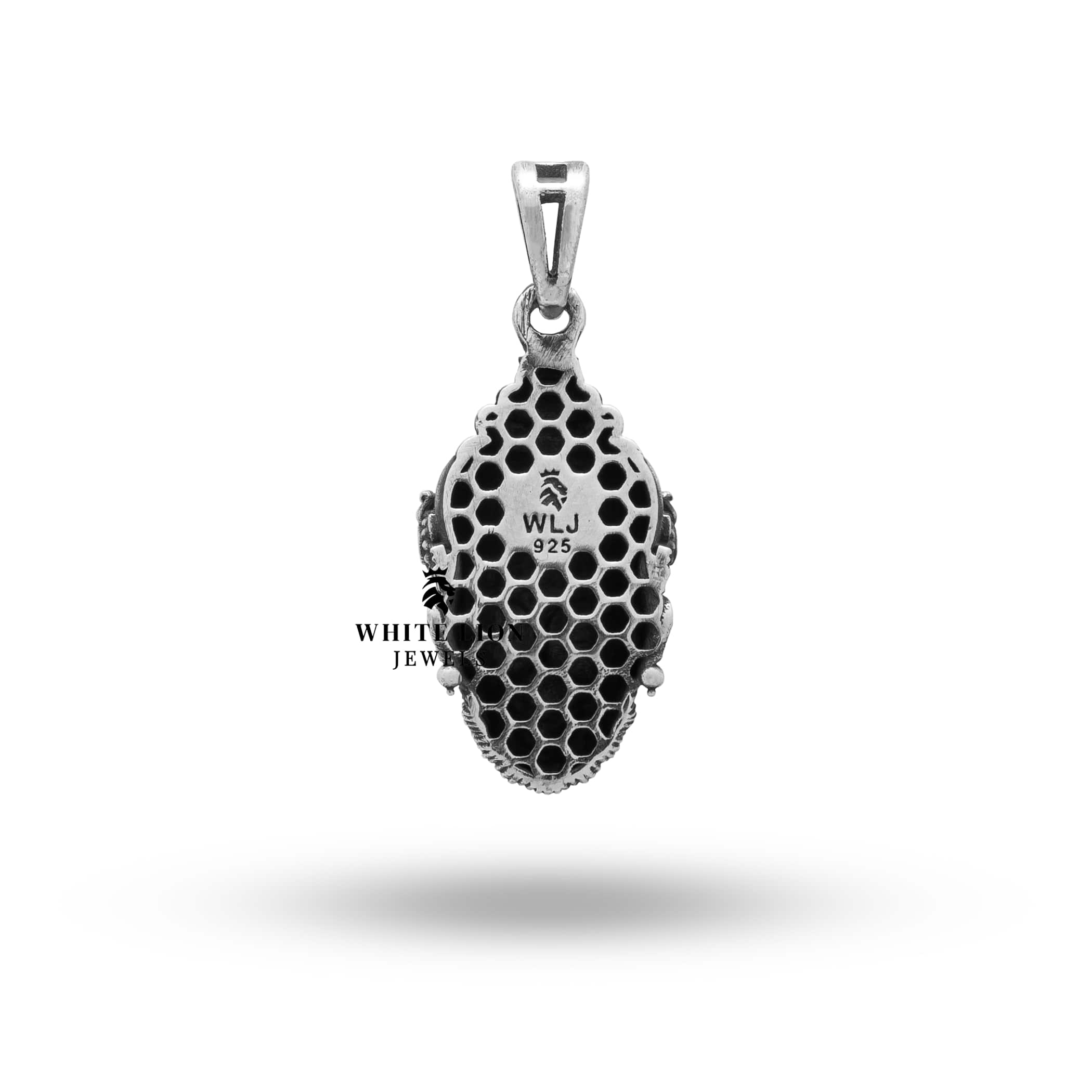 925 sterling silver Hanuman Face evil protector pendant on a chain, styled for wearing