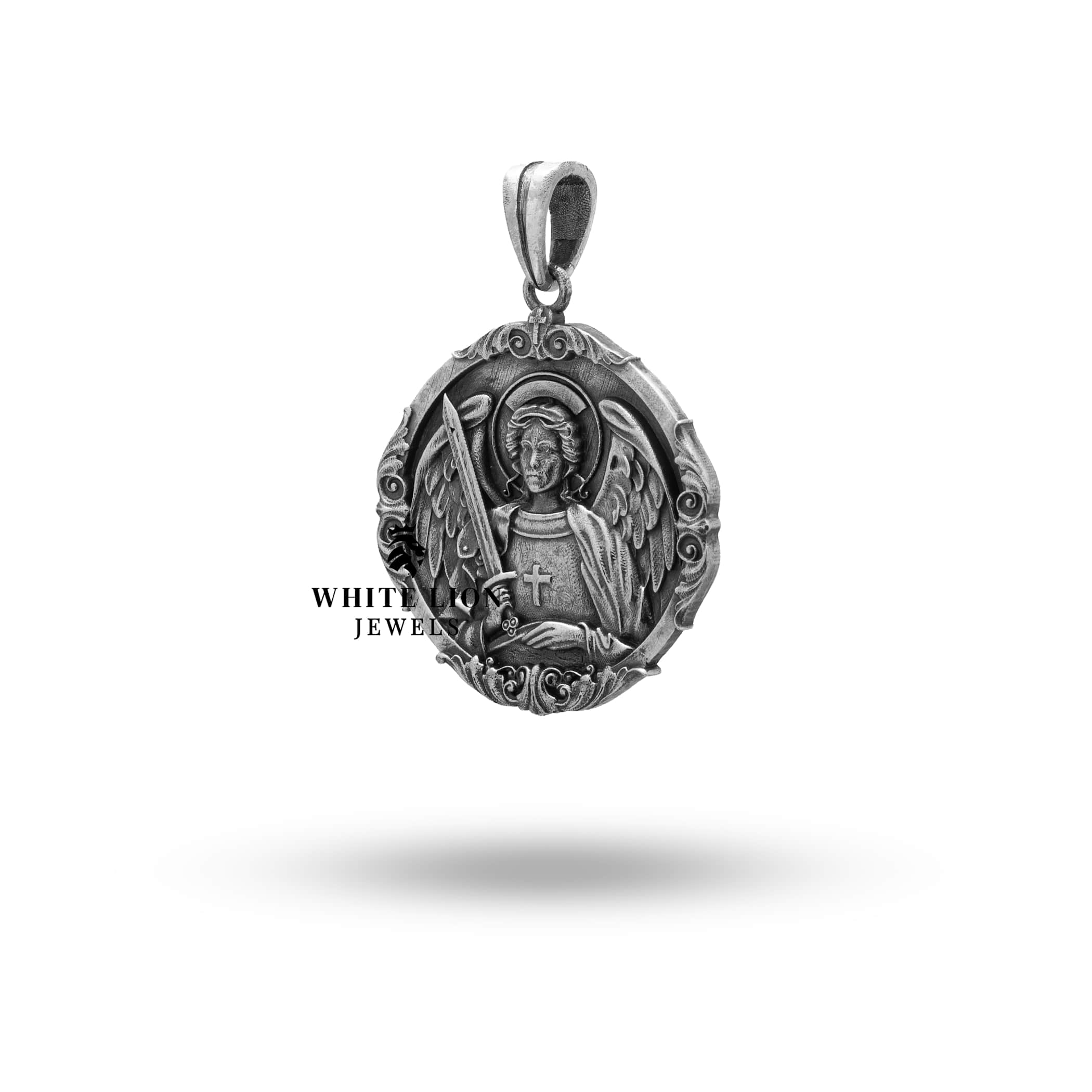 Side view of the St Michael Archangel Pendant highlighting the thickness and round shape of oxidized sterling silver.