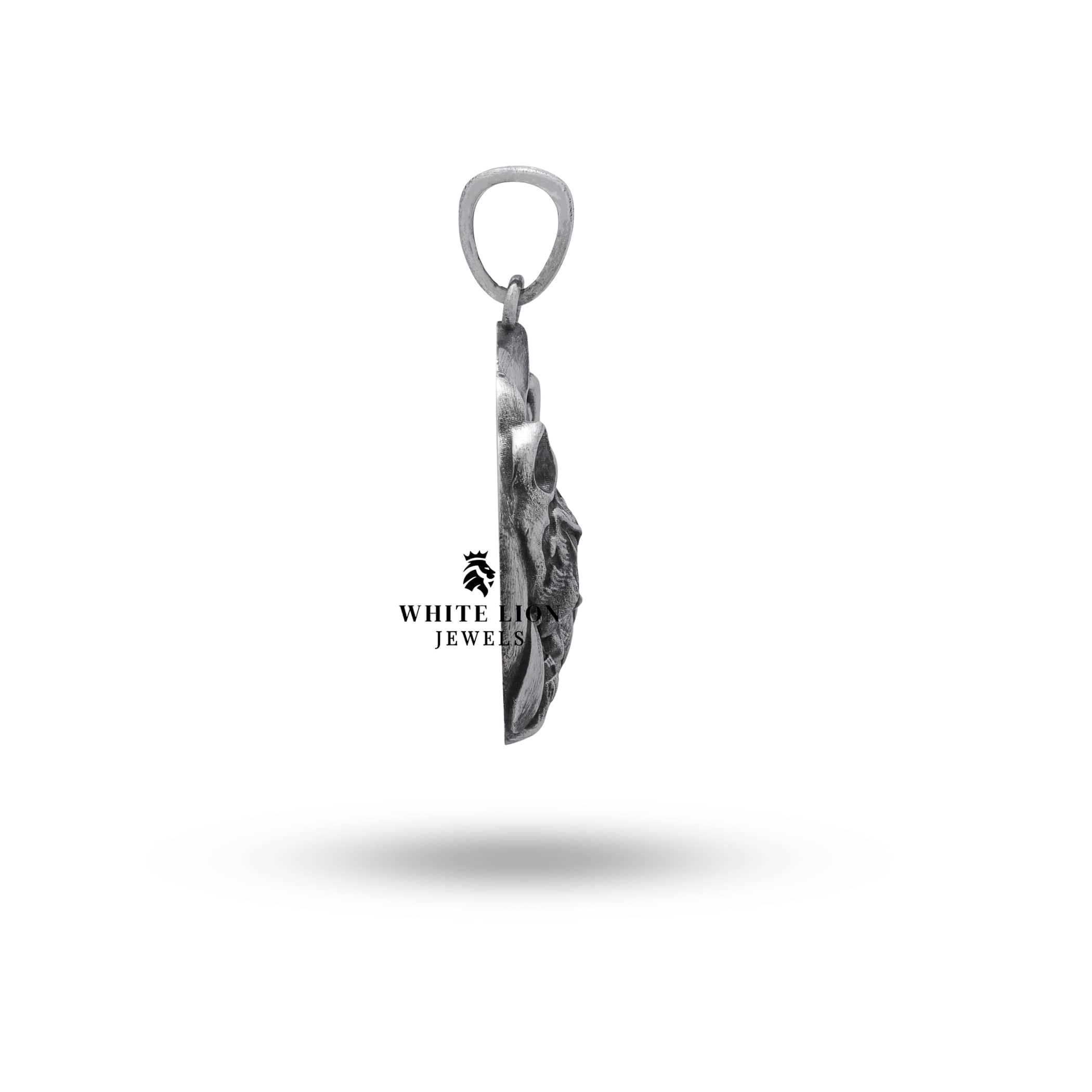 Artisan-crafted Tiger Cub Pendant in oxidized silver, angled view highlighting three-dimensional design.
