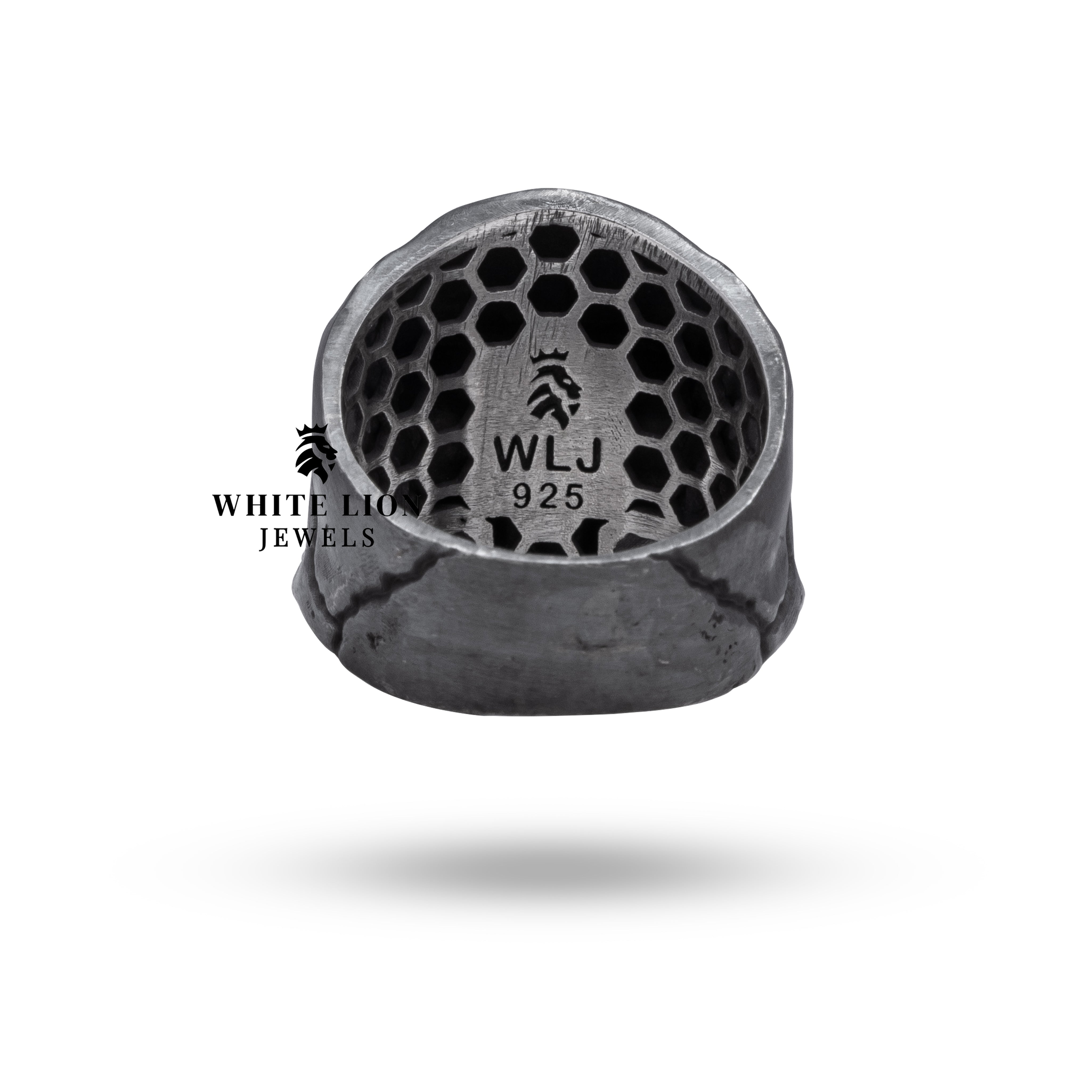 Intricate skull design in oxidized silver ring perfect for bold attire