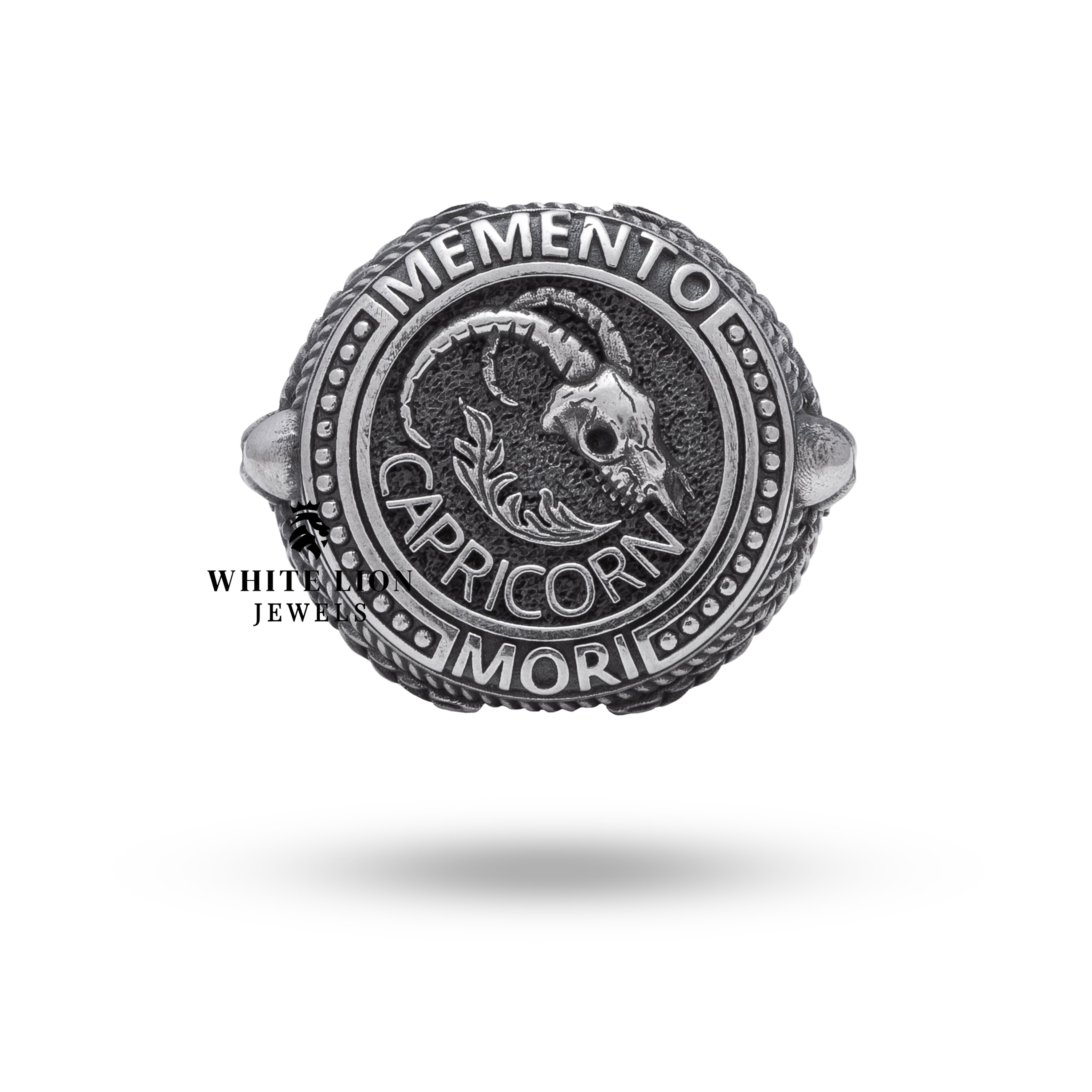 Side perspective of Memento Mori ring showing sterling silver craftsmanship and detail.