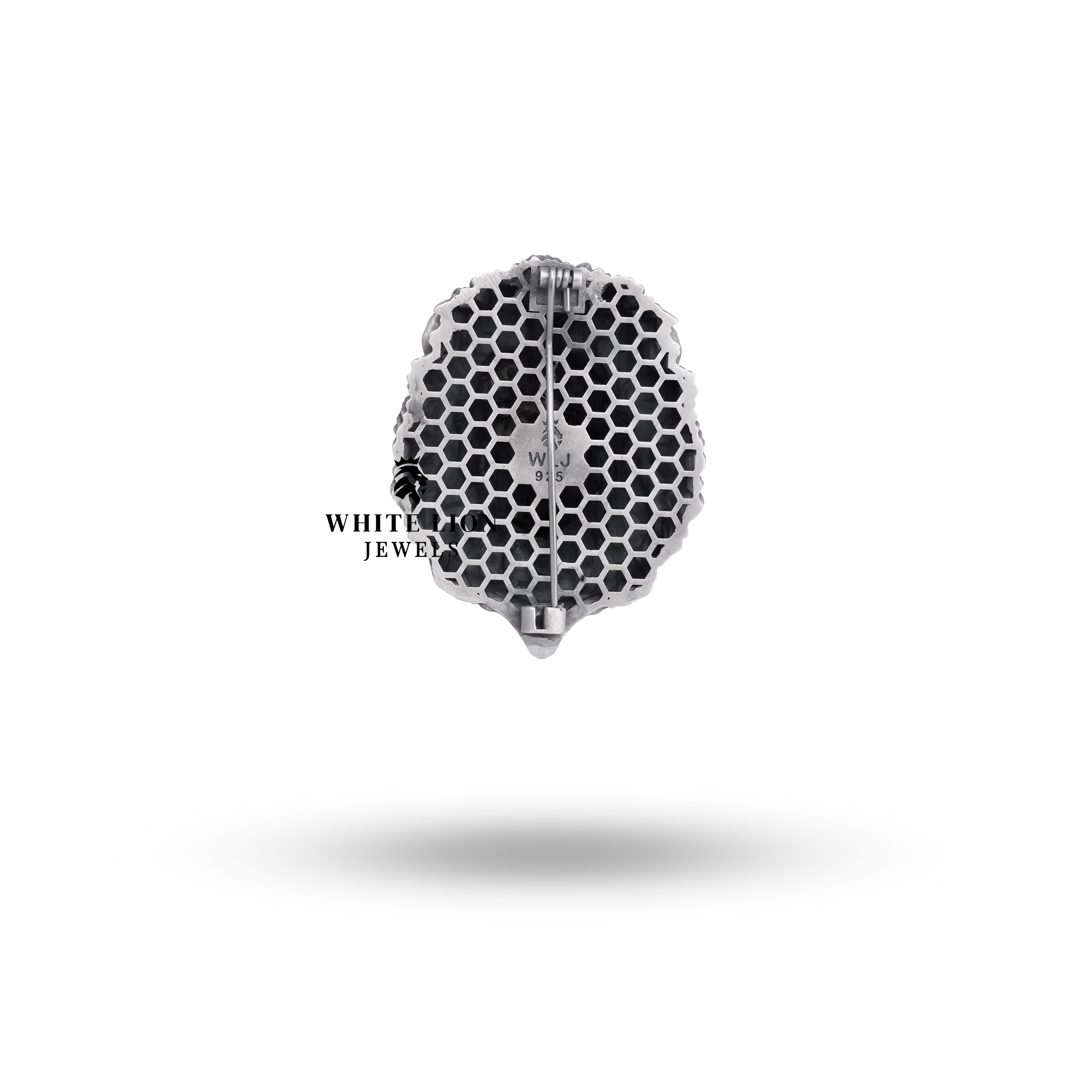 Close up display of the Roaring Lion 925 Sterling Silver Brooch showcasing its intricate detailing and luxurious finish.