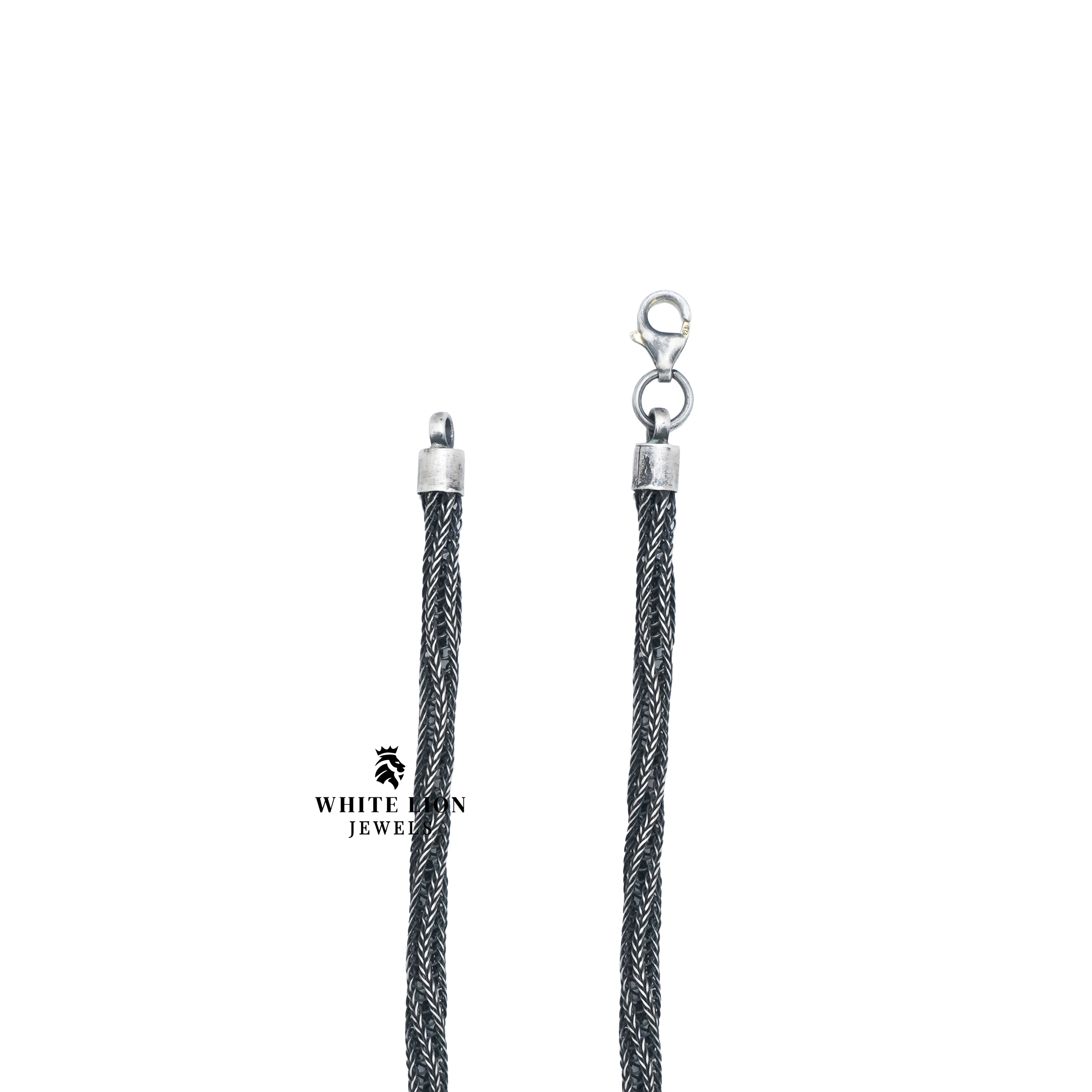 Close-up of Handcrafted Netted Rope Classic Chain in oxidized silver, highlighting its detailed craftsmanship