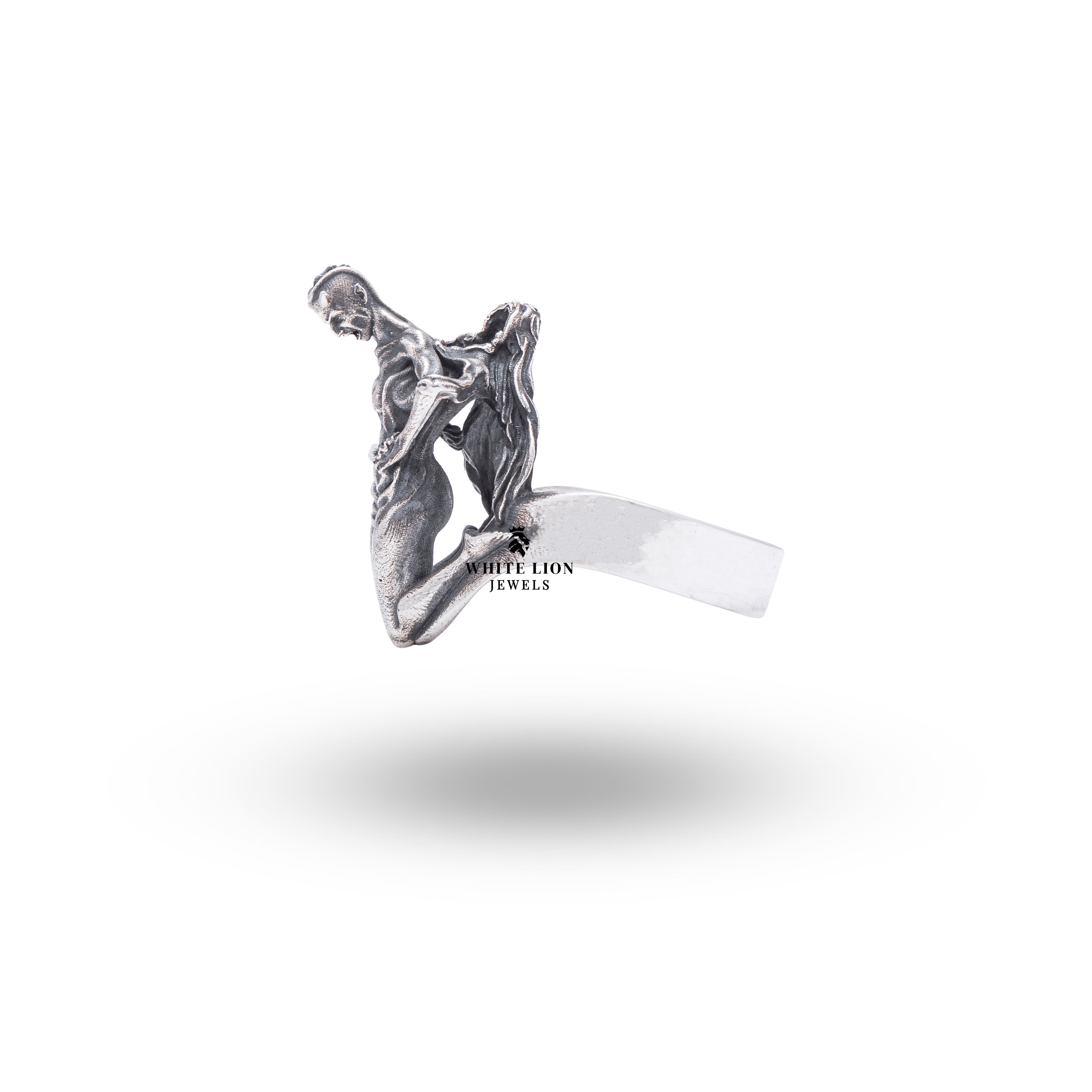 Top view of Human Devil Transformation 925 Sterling Silver Ring showing detailed motifs of duality.