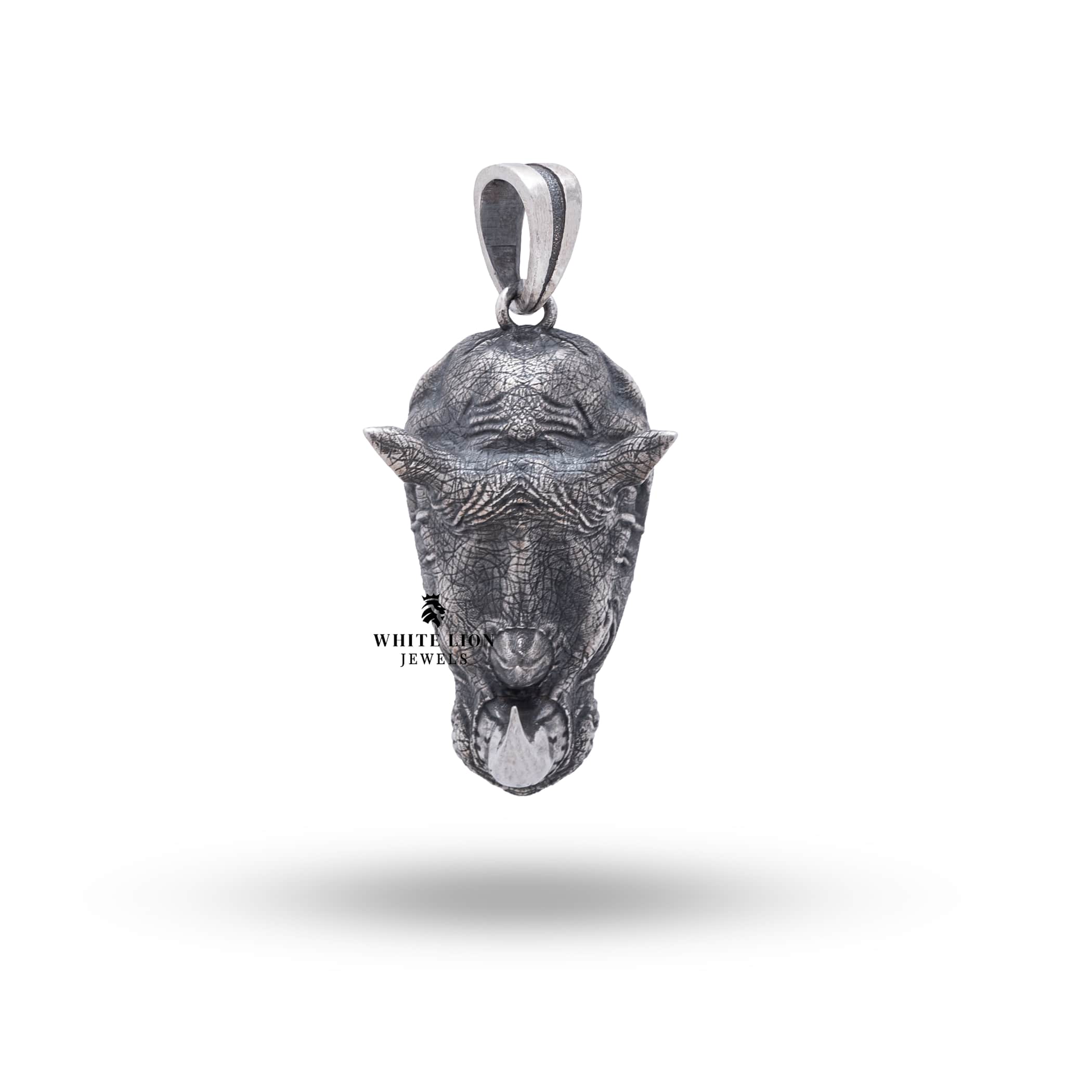 Elegant jungle-inspired silver pendant with detailed rhino head
