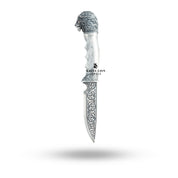 Closeup detail of the lion head engraving on the Sterling Silver Katar.