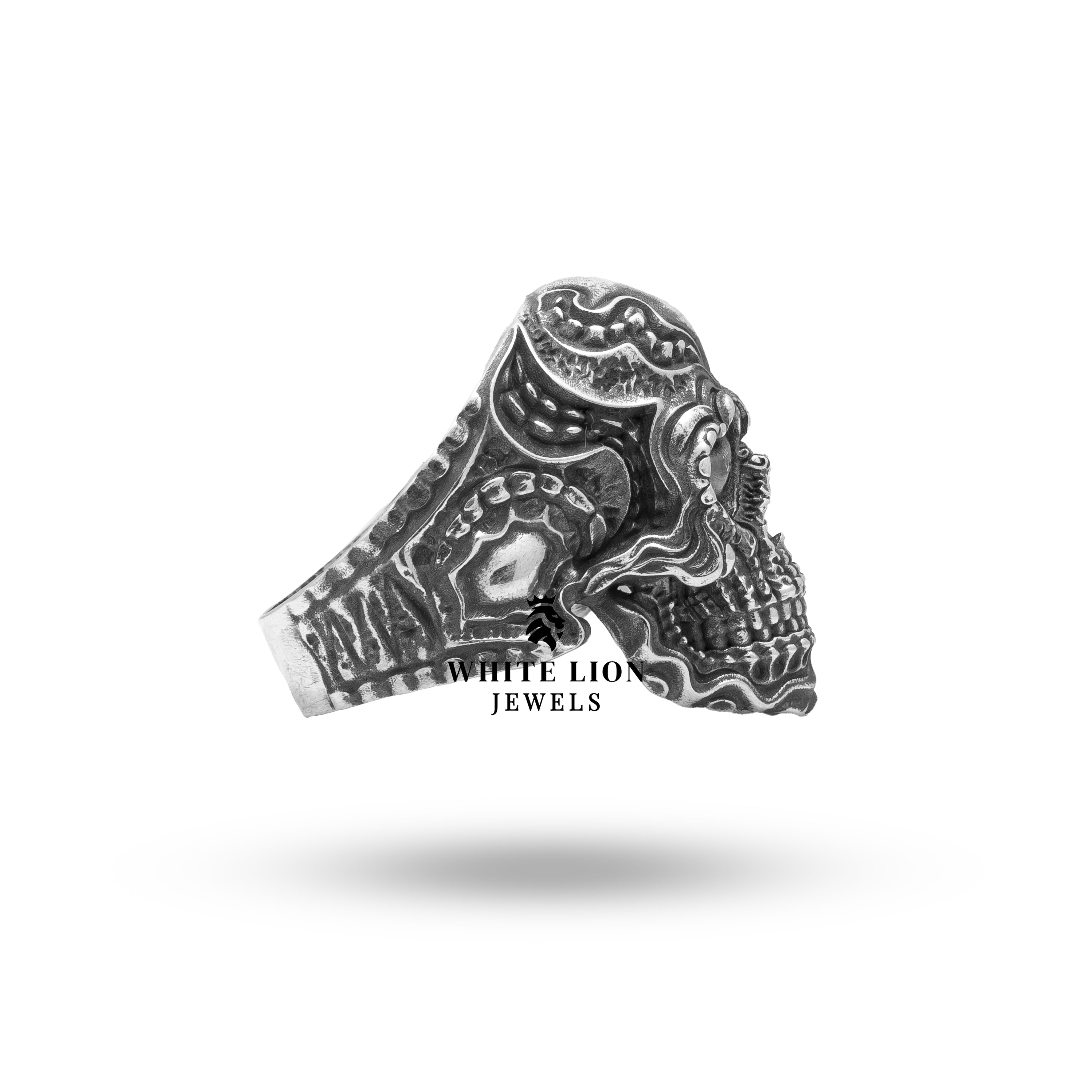 Hand showing Biomechanical Gothic Skull of Love Heart Sterling Silver Ring as chic accessory