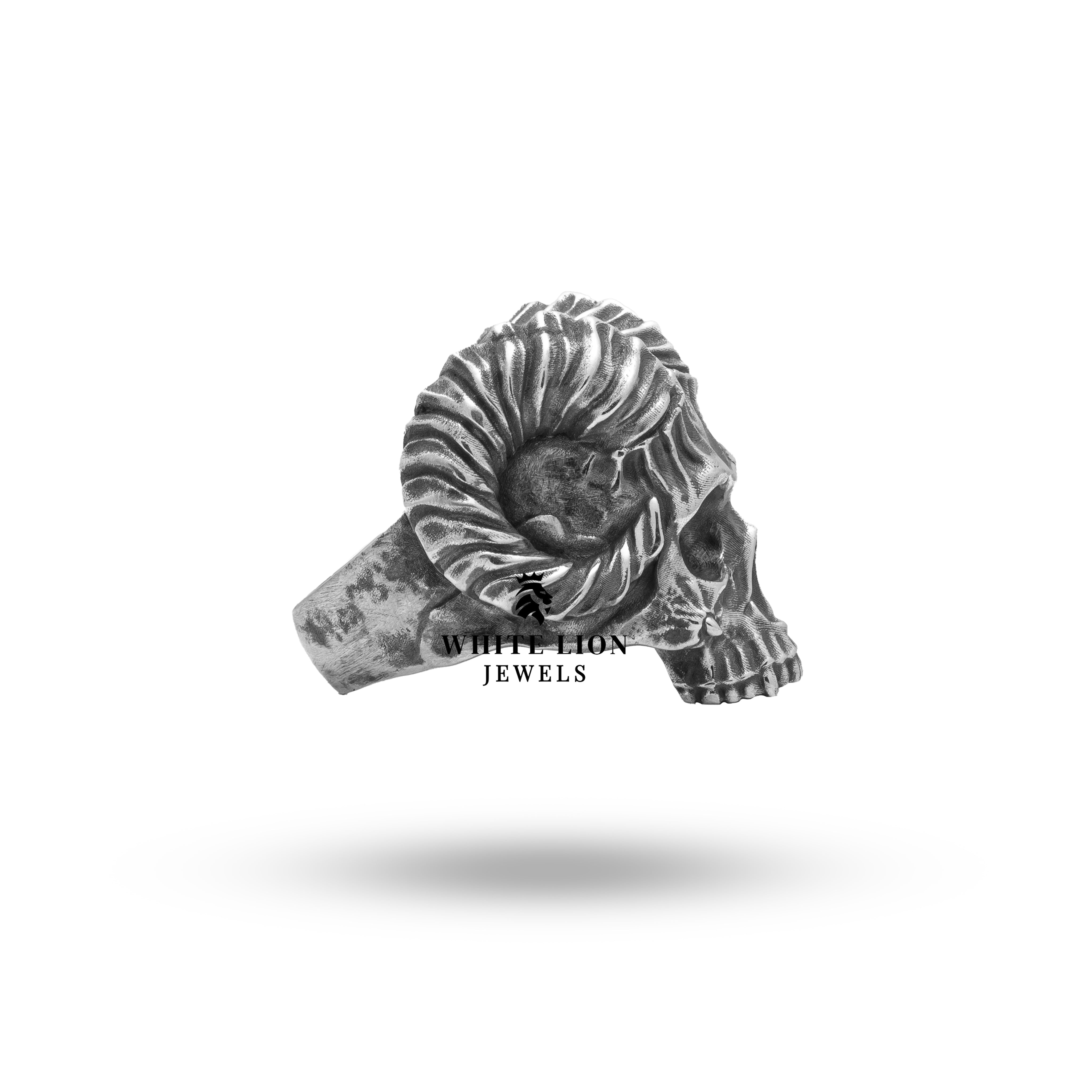 Oxidized silver ring featuring a demon skull with horns, showcasing artisanal craftsmanship.