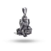 Oxidized silver pendant with elaborate depiction of Goddess Laxmi for fortune.