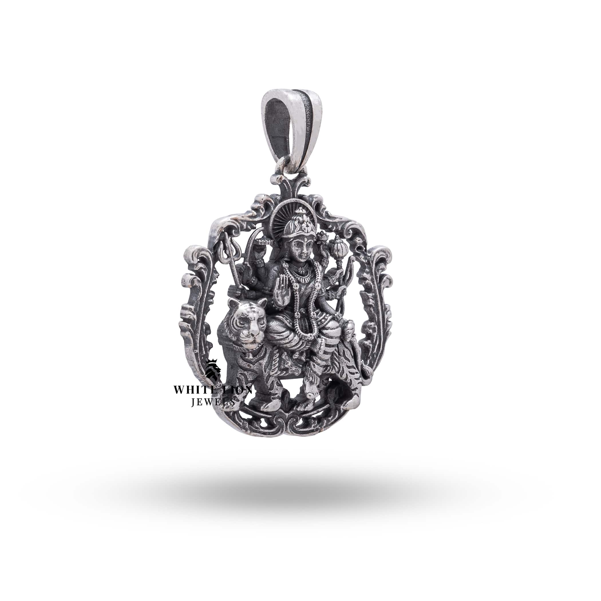 Side view of Ambe Ambika Mahadevi Pendant in oxidized silver, detailed craftsmanship by White Lion Jewels.
