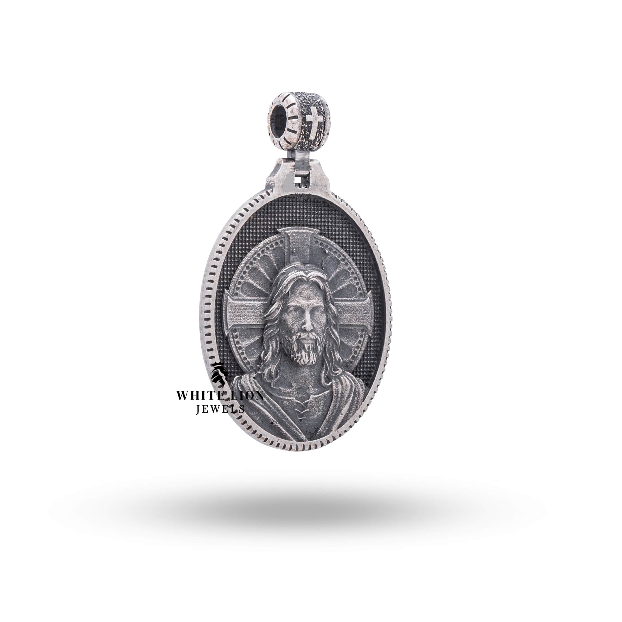 Side view of the Jesus 925 Sterling Silver Pendant, highlighting the depth and fine craftsmanship in oxidized silver