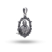Back view of Pramukh Swami Maharaj Sterling Silver Pendant displaying intricate design.
