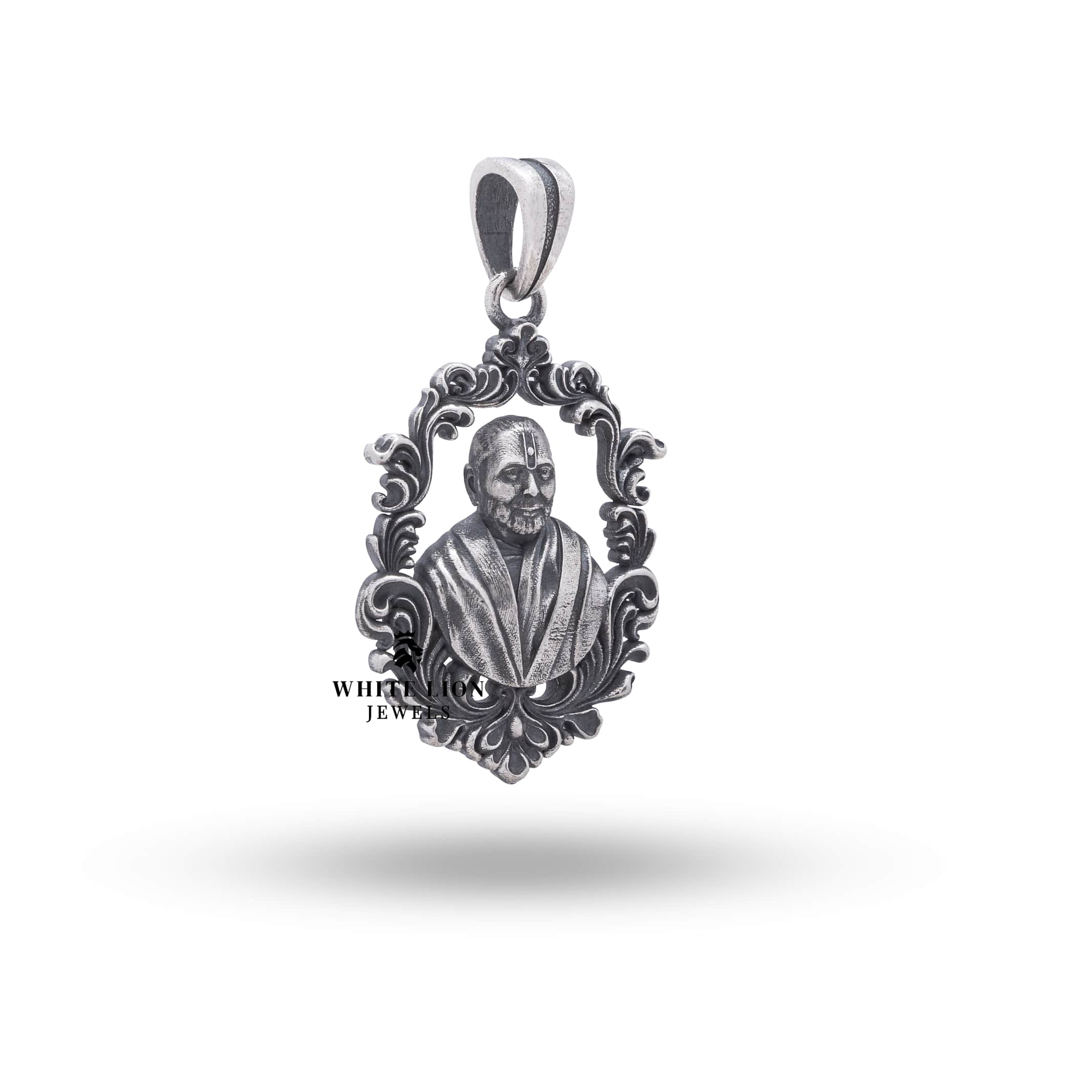 Back view of Pramukh Swami Maharaj Sterling Silver Pendant displaying intricate design.