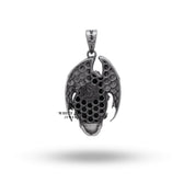 Dragon wings skull pendant worn on a dark-toned outfit