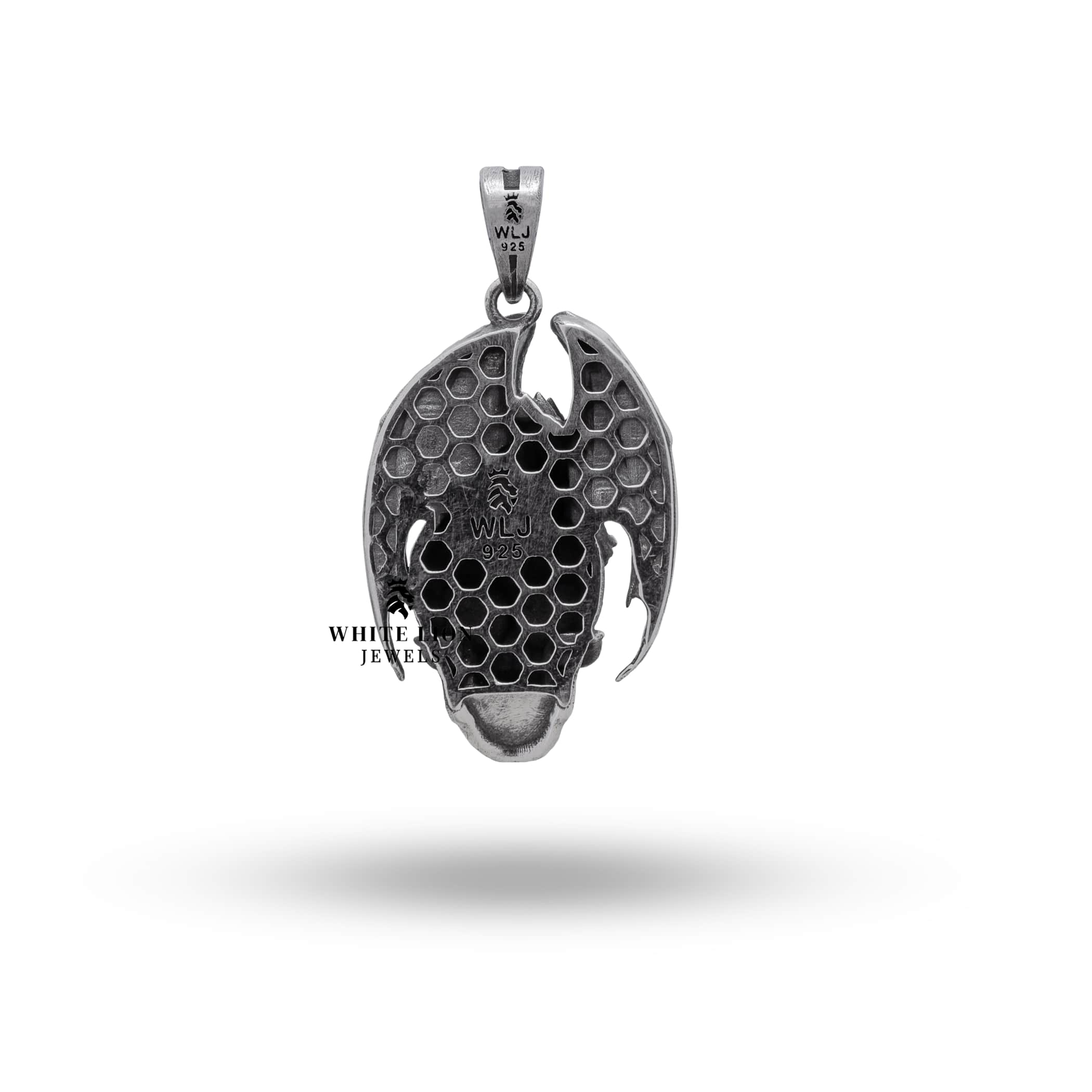 Dragon wings skull pendant worn on a dark-toned outfit