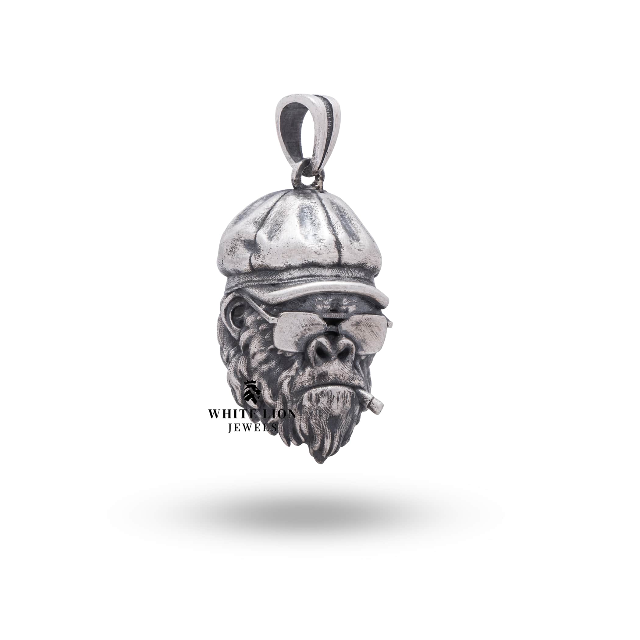 Close-up of the oxidized silver finish and craftsmanship on the Gangster Smoking Monkey Pendant