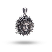 Side view of Apollo Sun God Pendant, revealing intricate detailing on oxidized sterling silver.