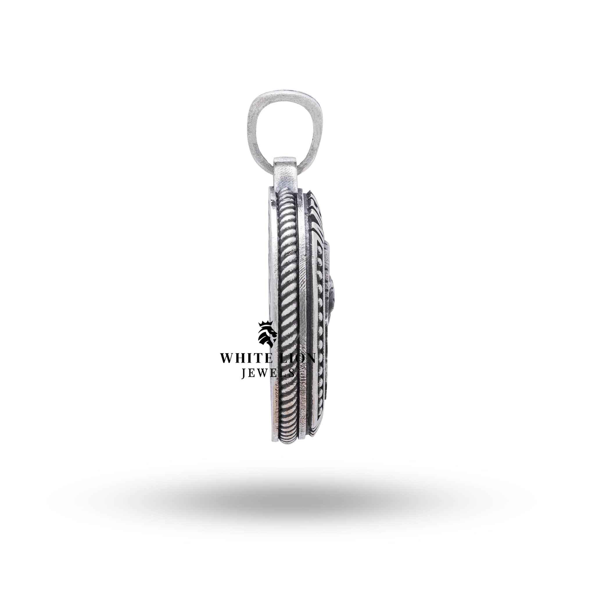 Side perspective of Memento Mori Goat pendant highlighting the craftsmanship in oxidized 925 Sterling Silver.