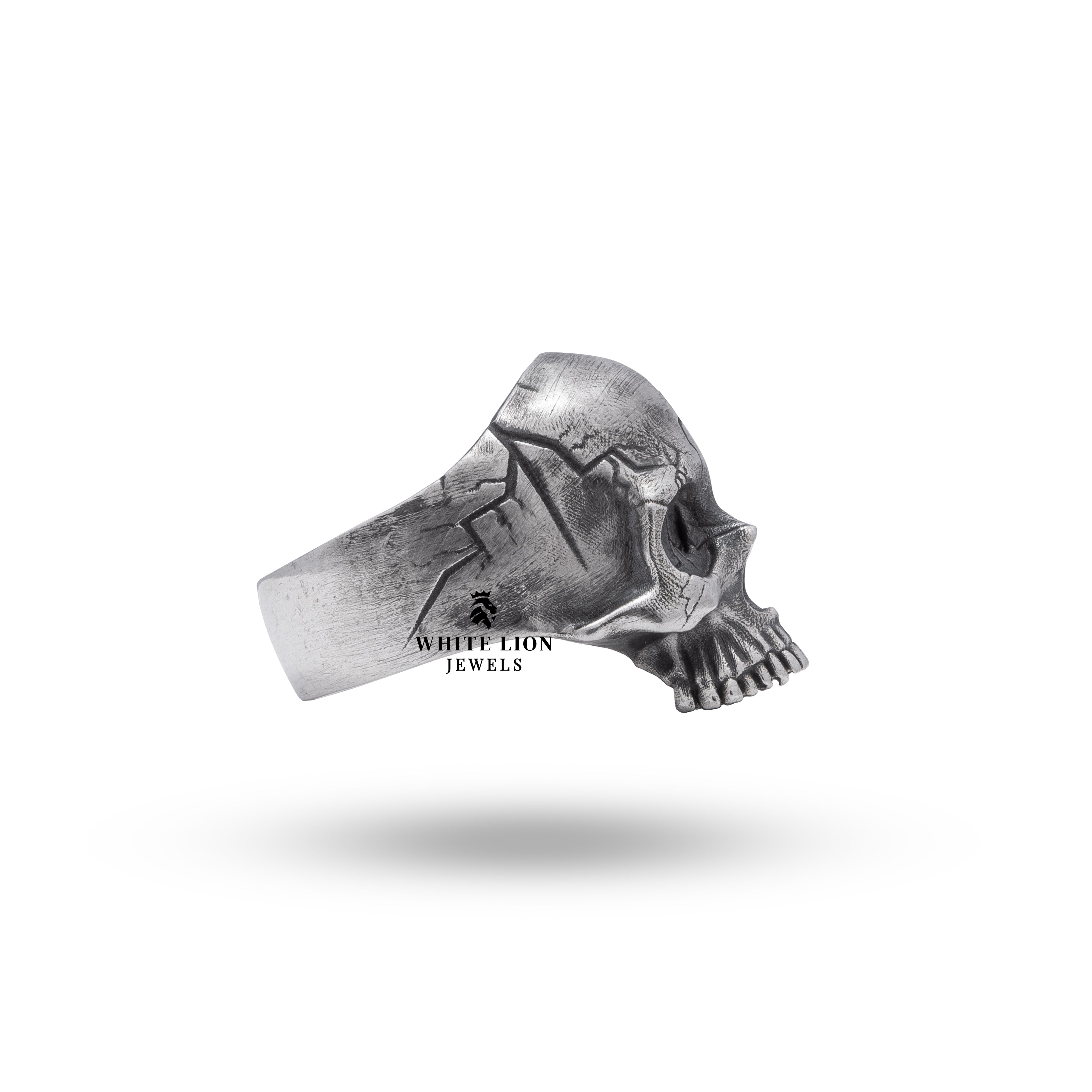 Model wearing Half Jaw Crack Eye sterling silver ring, illustrating its bold, edgy look