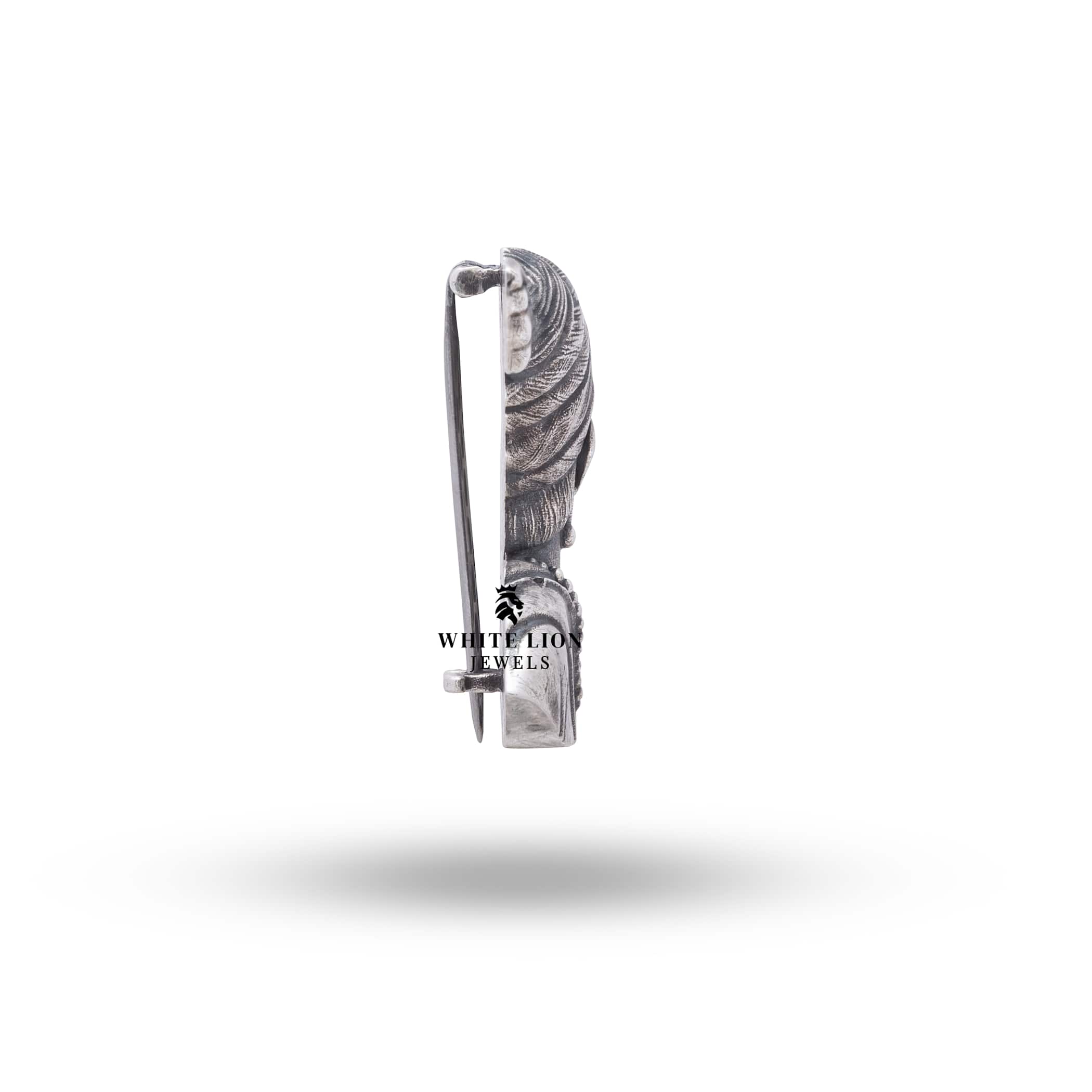 Back view of the oxidized silver Chhatrapati Raje Shivaji Maharaj brooch pin, highlighting sturdy clasp