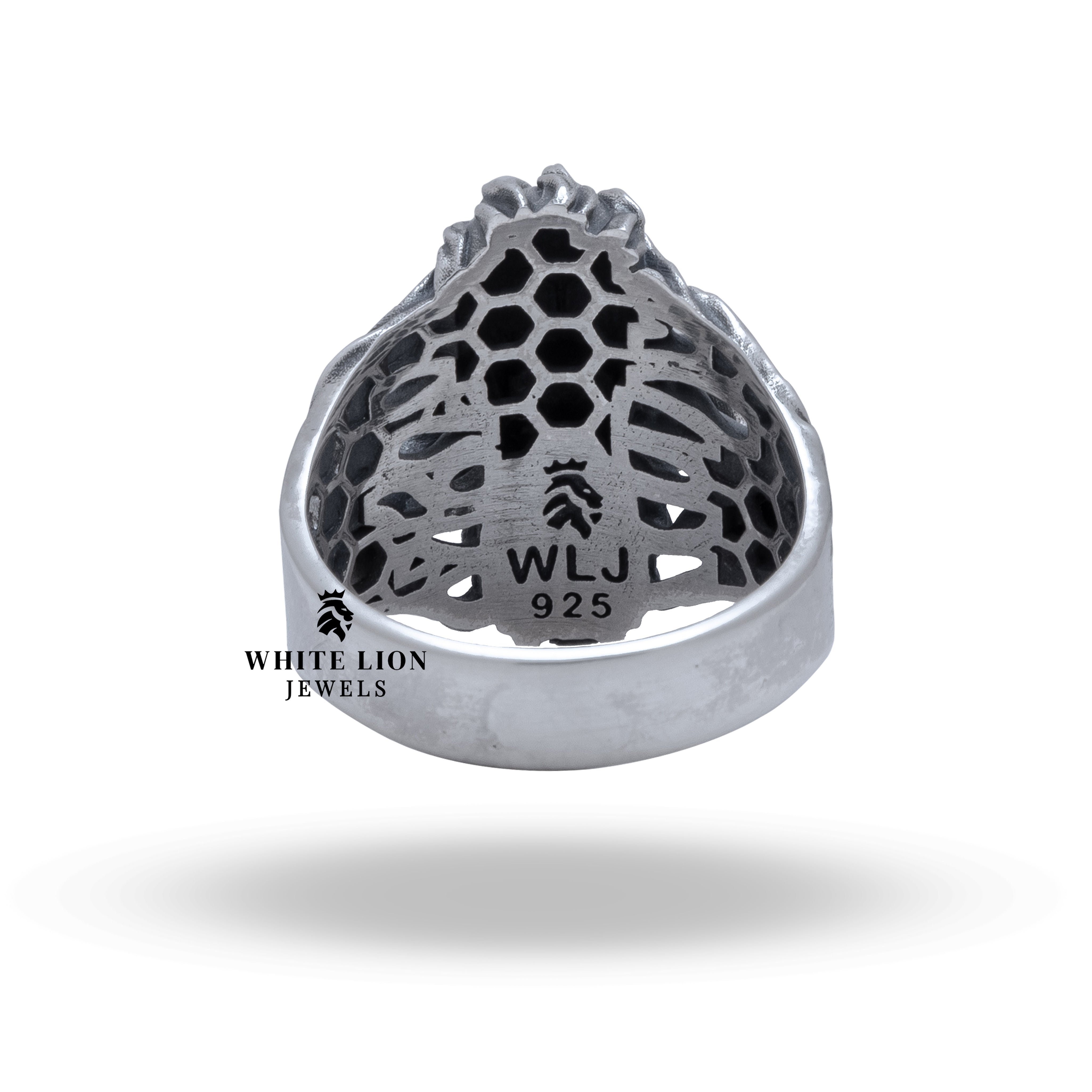 Scream Mask Transformation 925 silver ring elegantly presented in a jewelry box with White Lion Jewels branding.