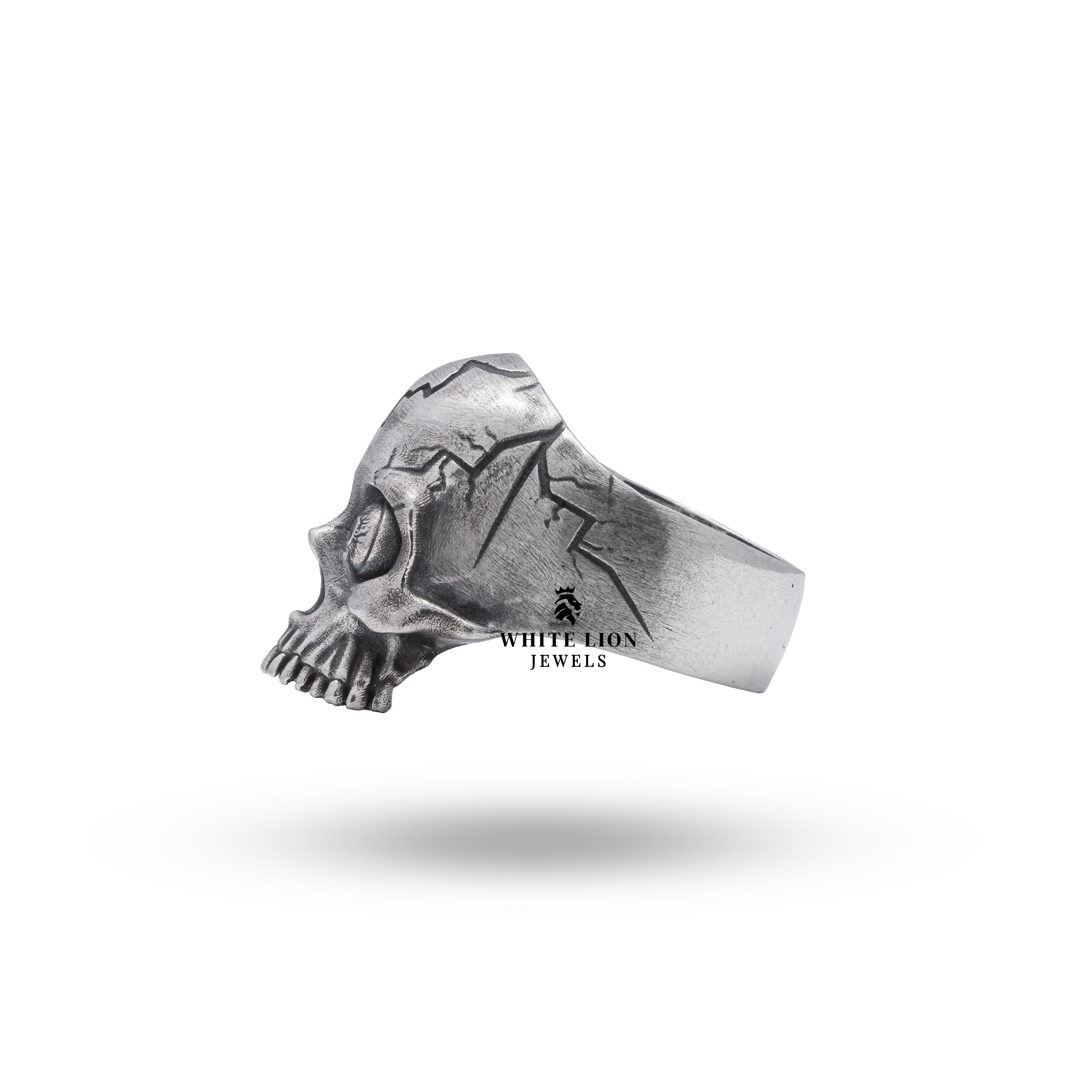 Half Jaw Crack Eye sterling silver ring presented in brand packaging, depicting quality