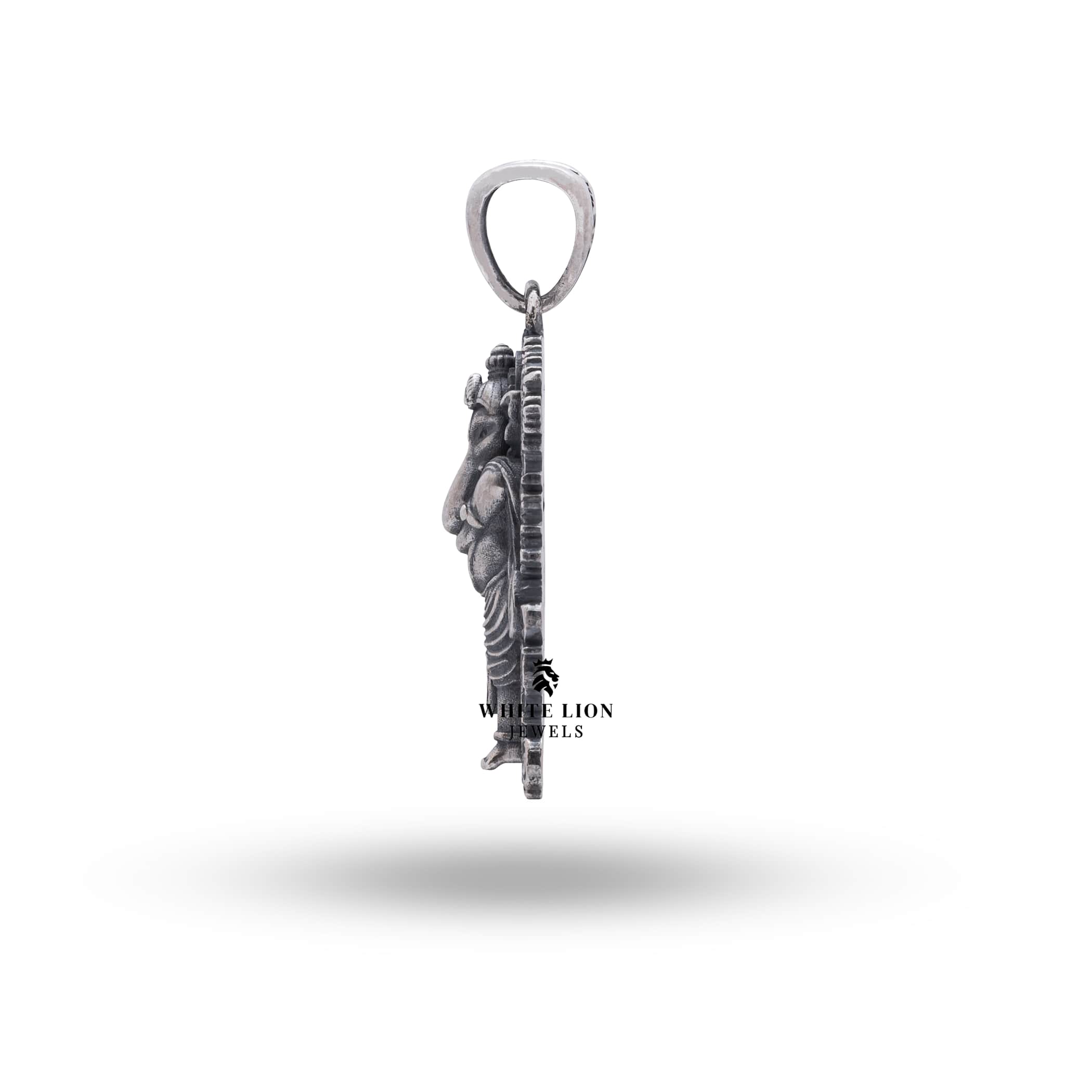 Lifestyle image displaying the Lord Ganesha Silver Pendant paired with a traditional outfit