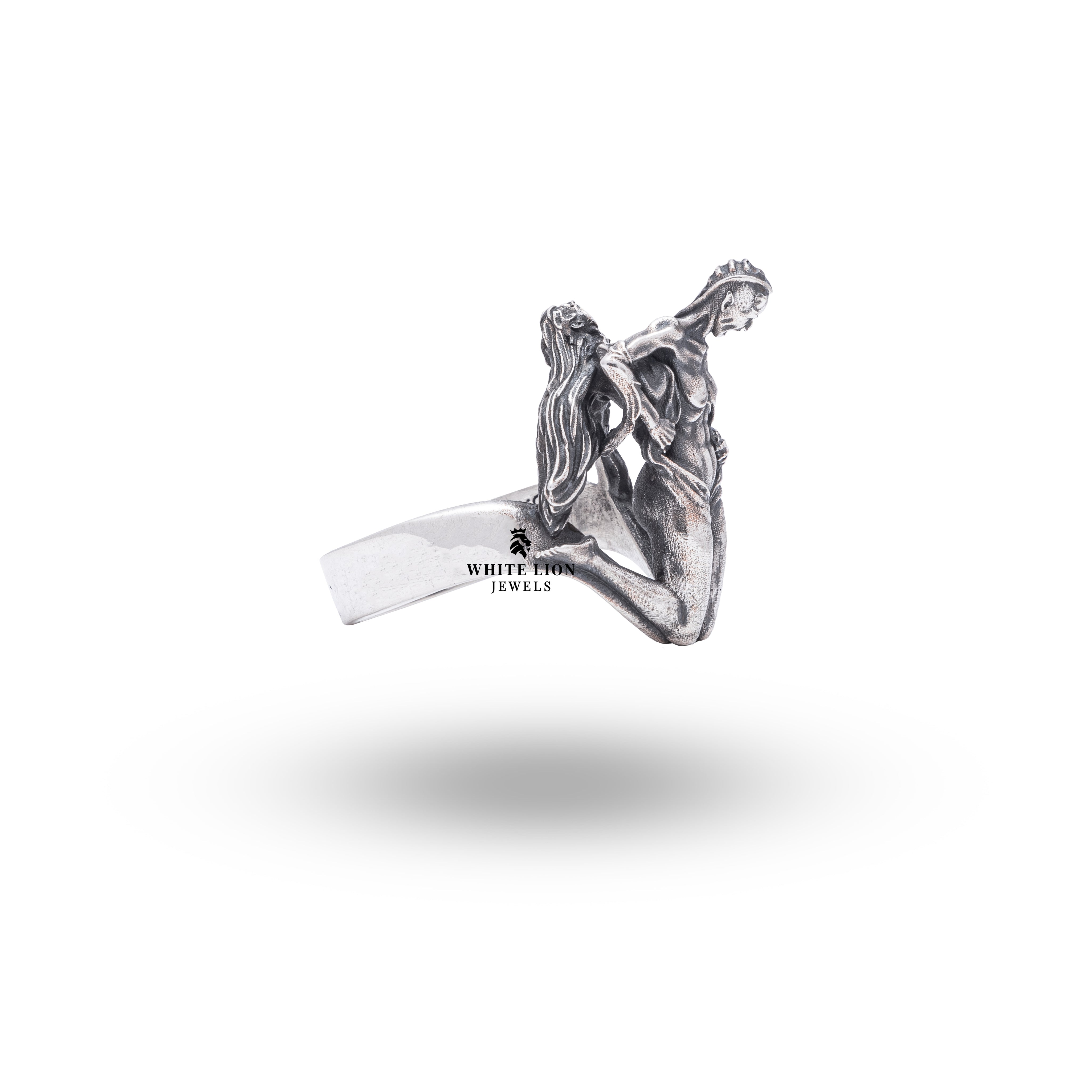 Side view of Human Devil Transformation 925 Sterling Silver Ring detailing the oxidized finish.