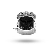 Styled image of the Emperor King Crown Ring paired with a regal costume, highlighting its statement-making design.