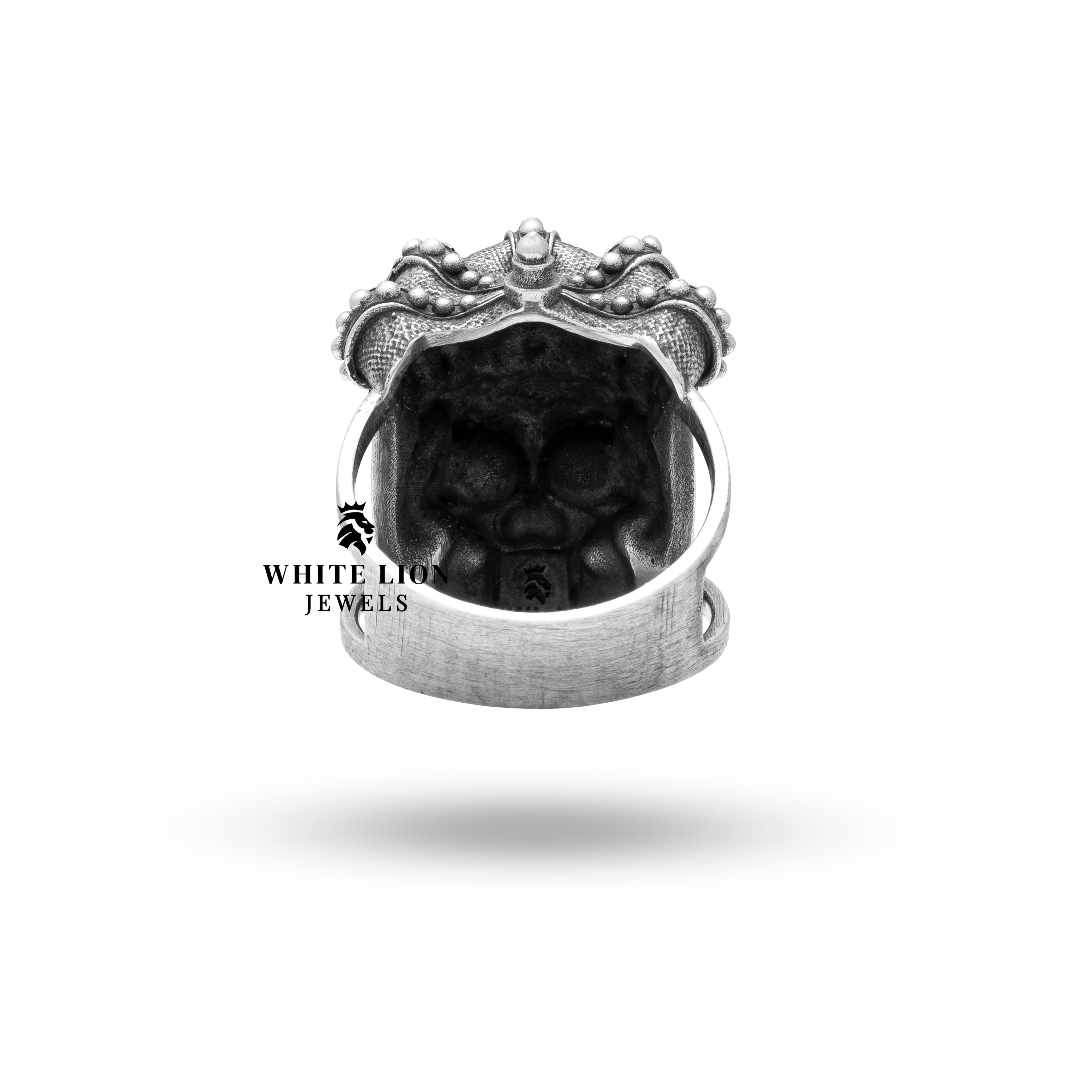 Styled image of the Emperor King Crown Ring paired with a regal costume, highlighting its statement-making design.