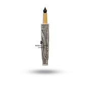 Close-up of the elegant Phoenix Fire Bird design on a silver fountain pen.